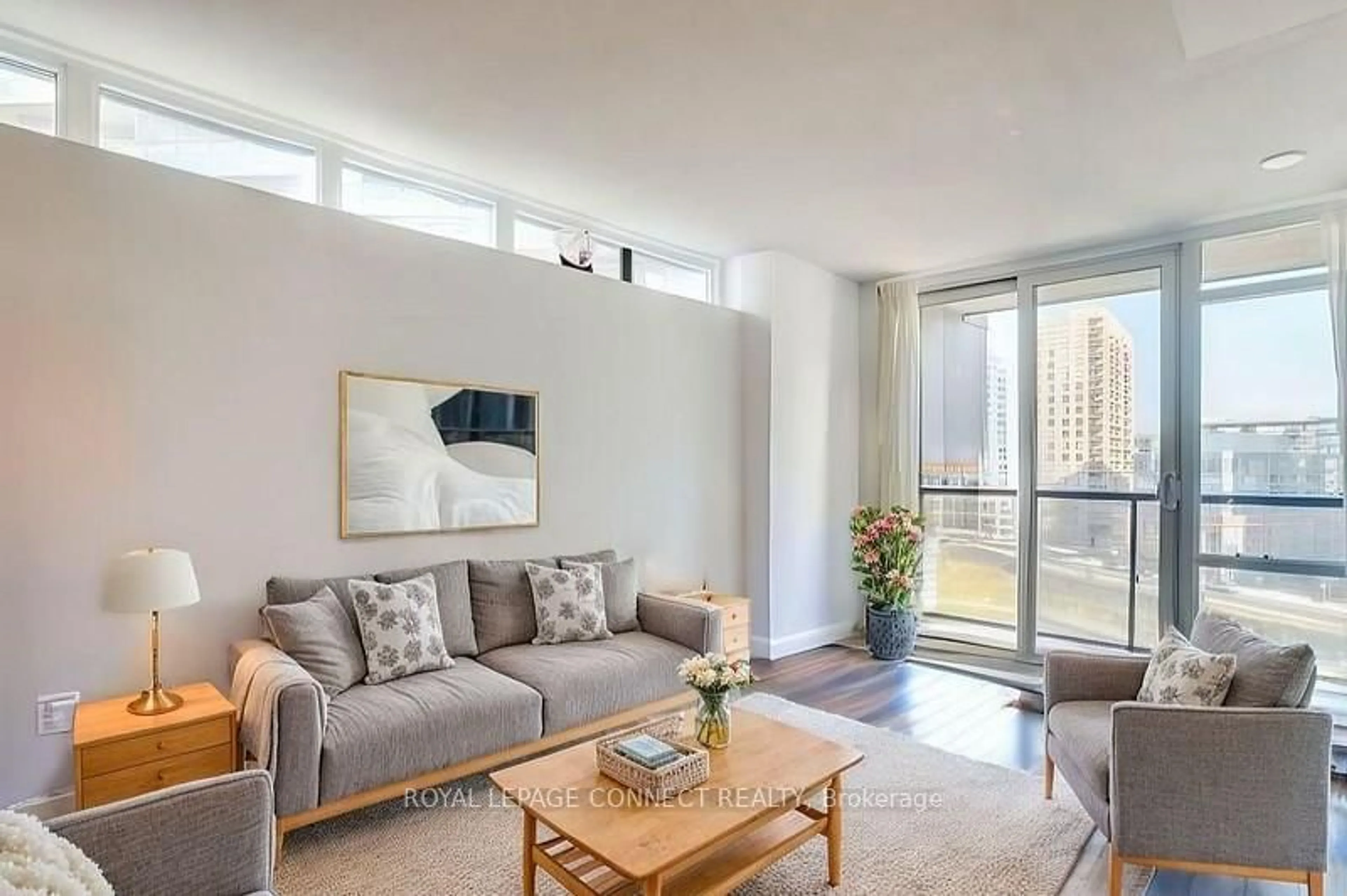 Living room with furniture, unknown for 20 Joe Shuster Way #702, Toronto Ontario M6K 0A3