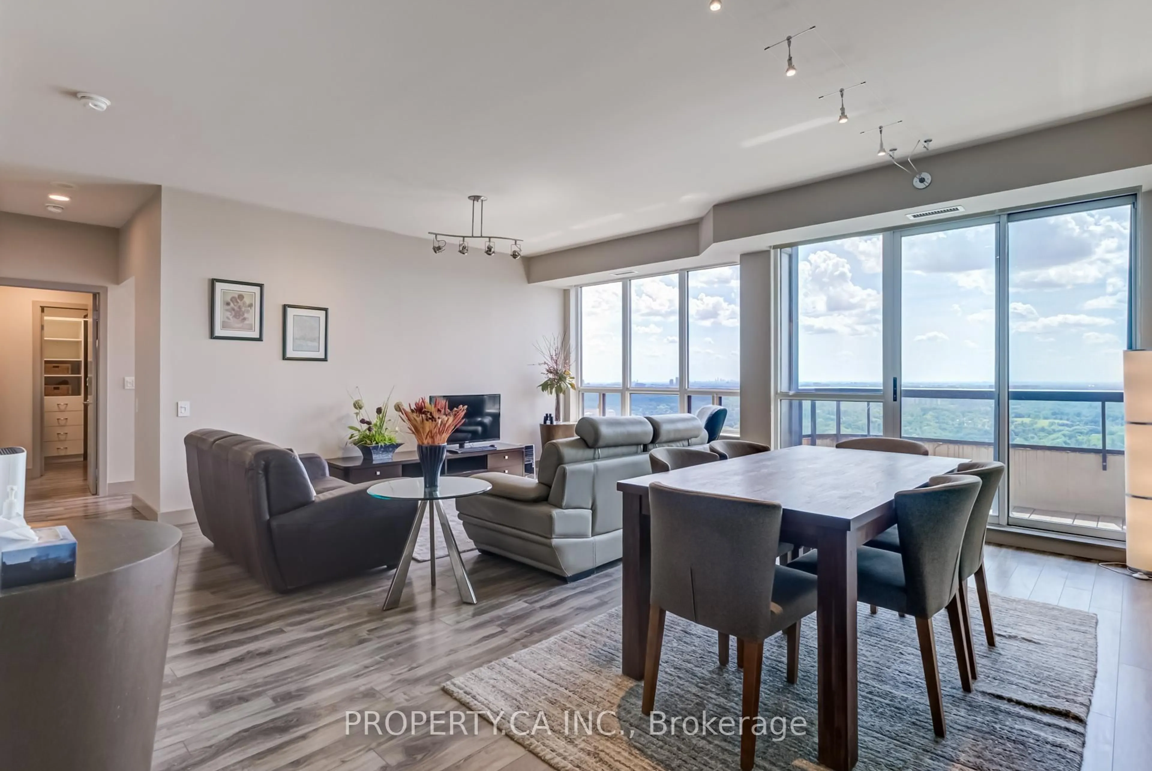 Living room with furniture, wood/laminate floor for 8 Hillcrest Ave #PH 201, Toronto Ontario M2N 6Y6