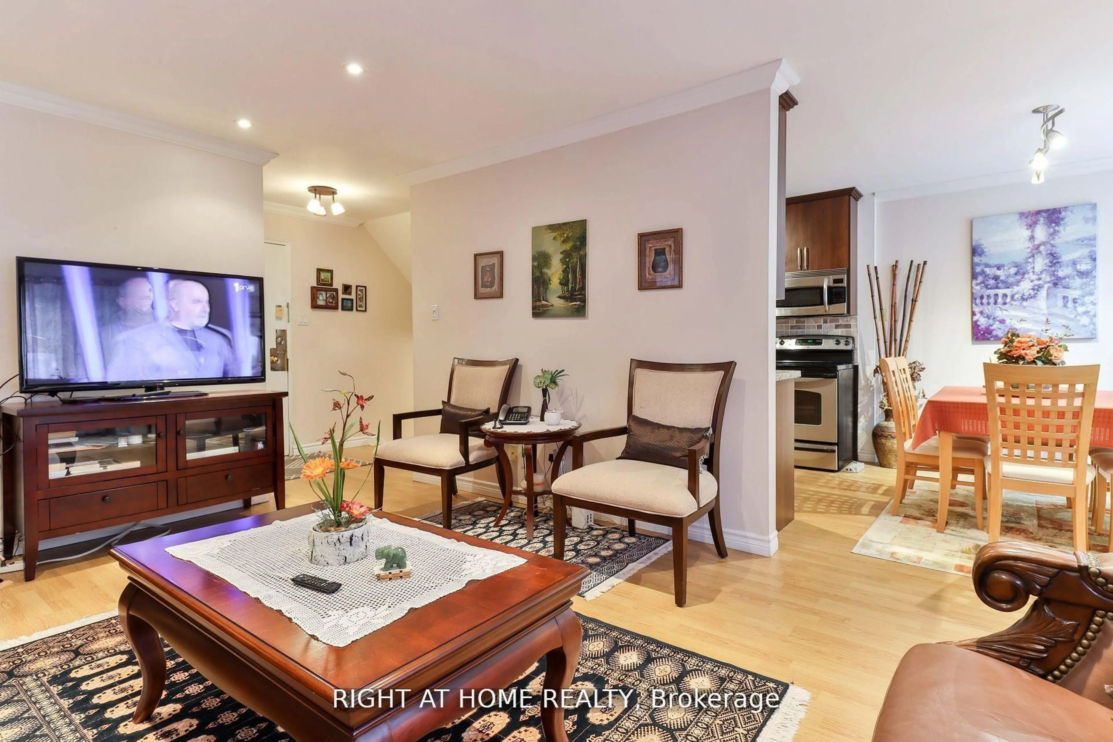 Living room with furniture, unknown for 50 Three Valleys Dr #12, Toronto Ontario M3A 3B5