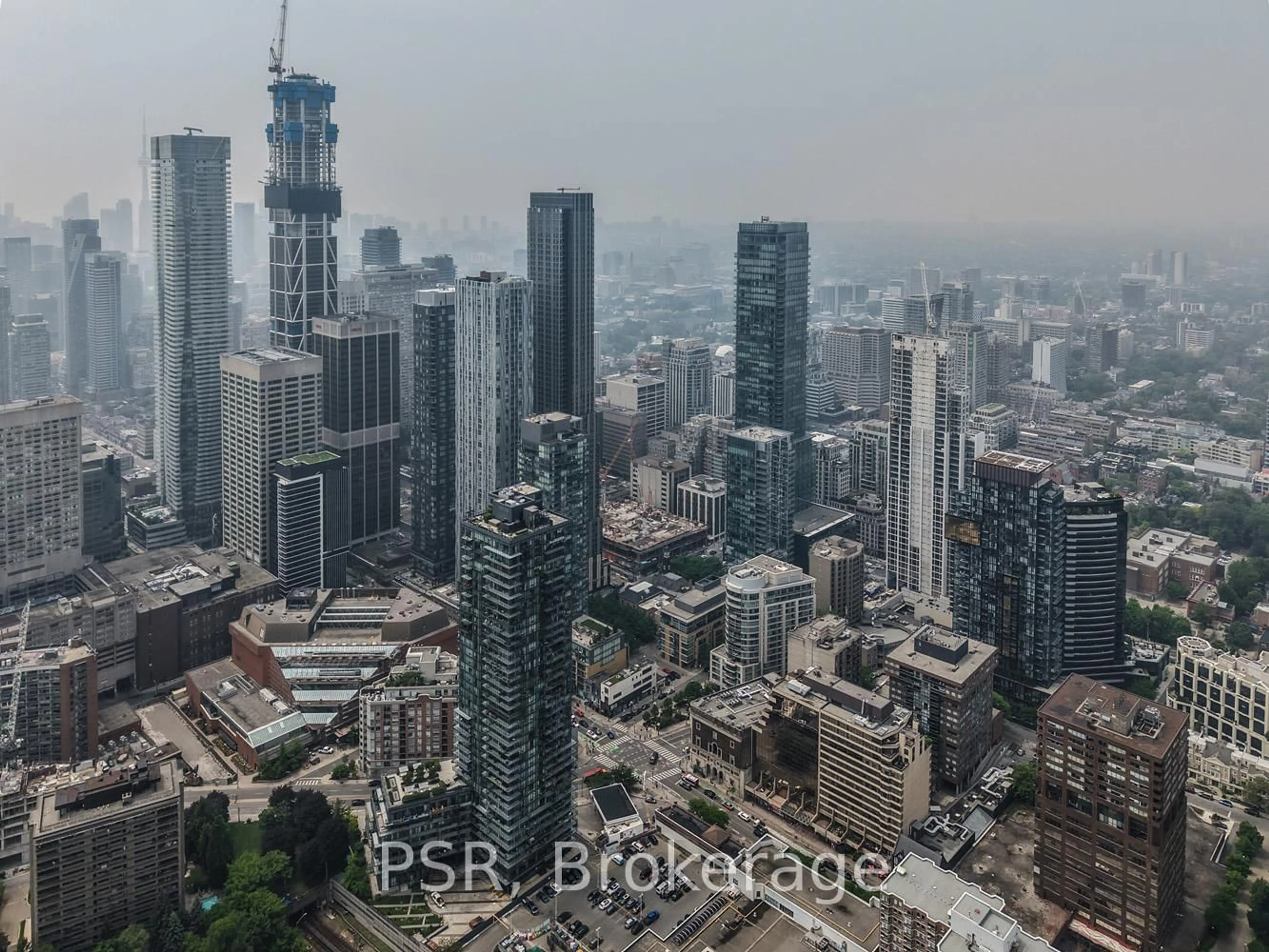 A pic from outside/outdoor area/front of a property/back of a property/a pic from drone, city buildings view from balcony for 18 Yorkville Ave #2103, Toronto Ontario M4W 3Y8