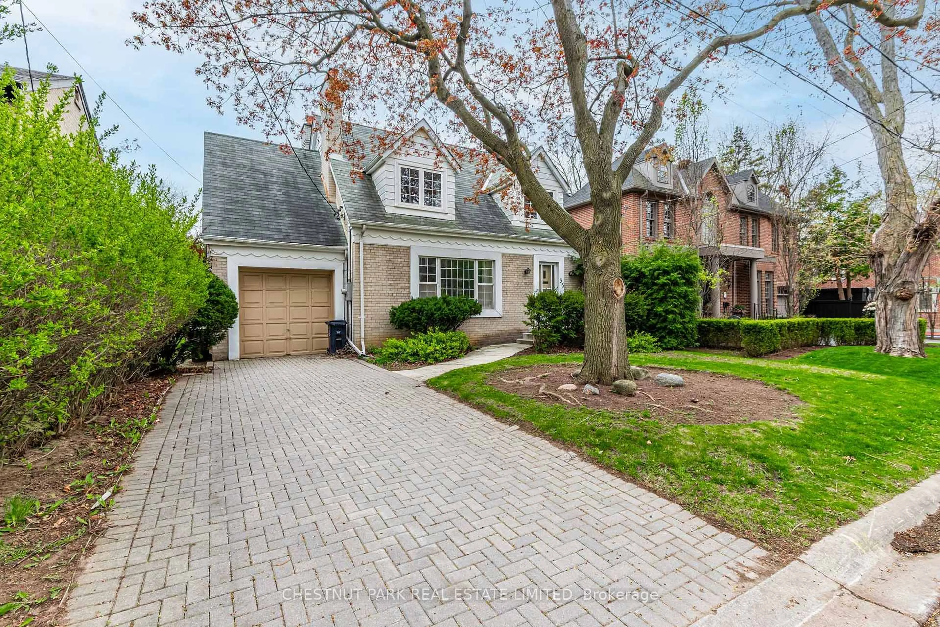 Home with brick exterior material, street for 53 Caribou Rd, Toronto Ontario M5N 2A6