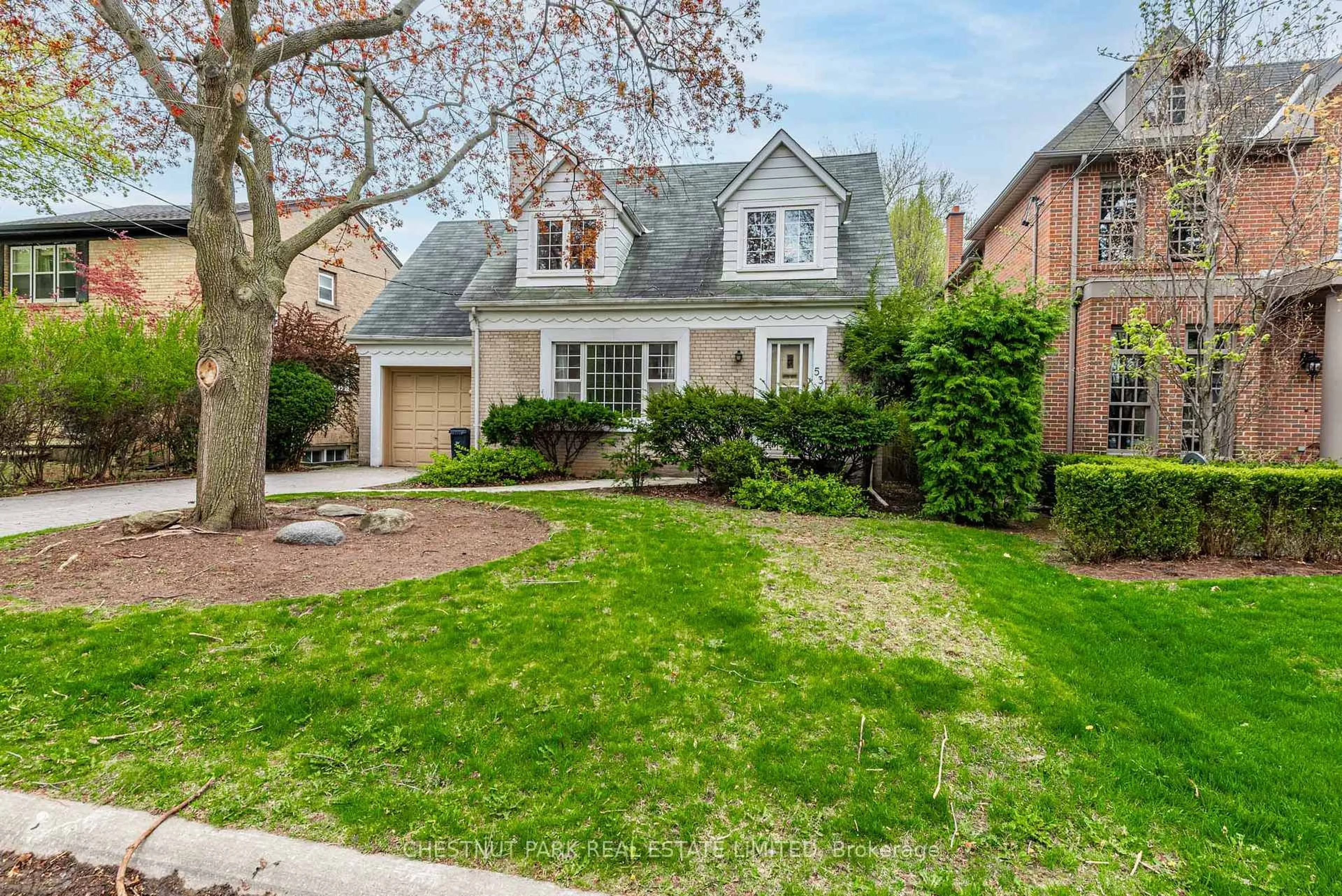 Home with brick exterior material, street for 53 Caribou Rd, Toronto Ontario M5N 2A6