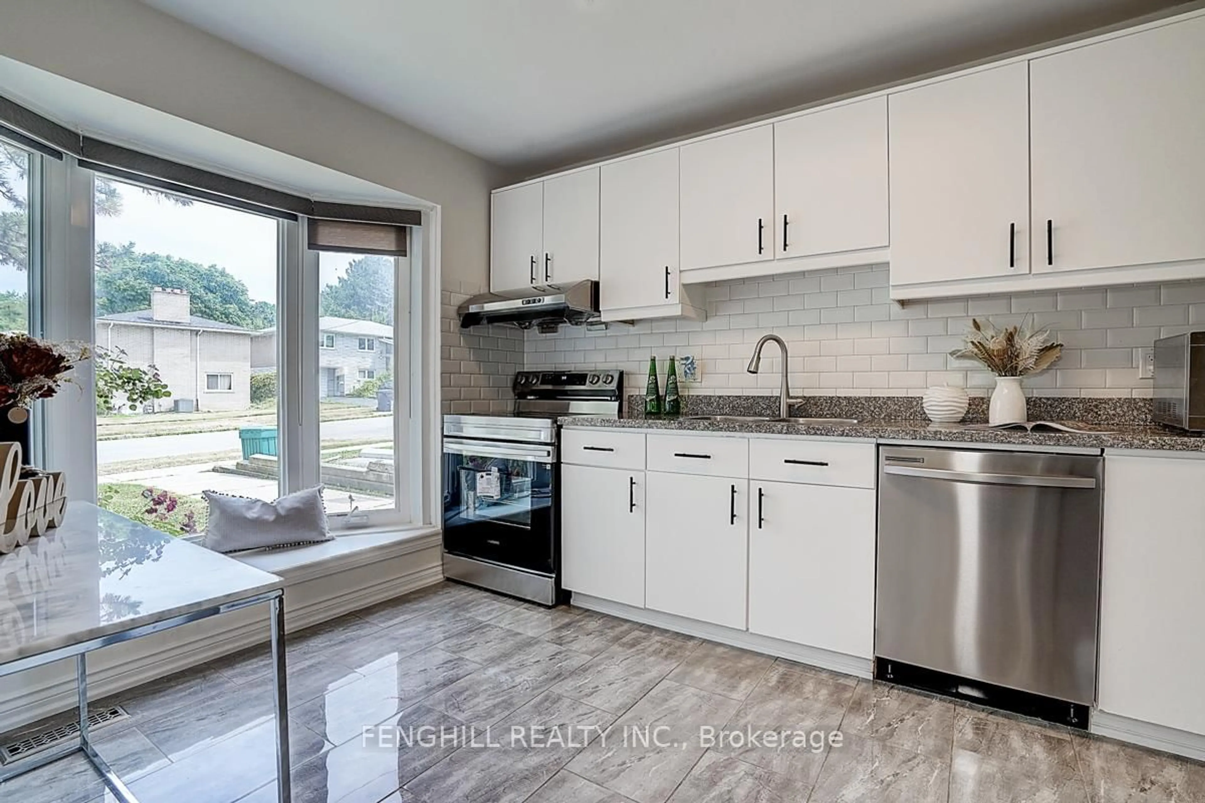 Open concept kitchen, ceramic/tile floor for 65 Rameau Dr #110, Toronto Ontario M2H 1T6