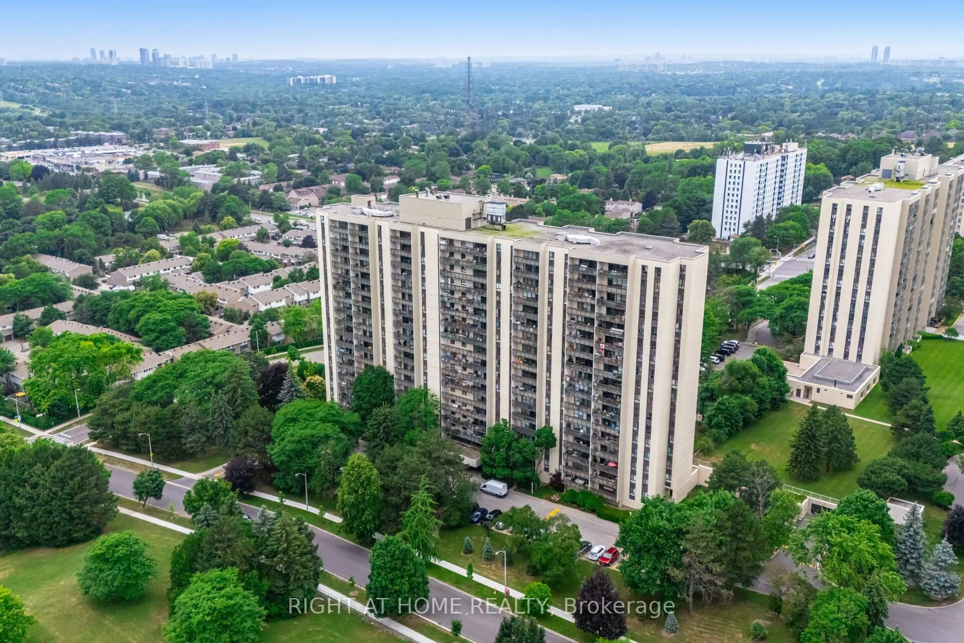A pic from outside/outdoor area/front of a property/back of a property/a pic from drone, city buildings view from balcony for 260 Seneca Hill Dr #210, Toronto Ontario M2J 4S6