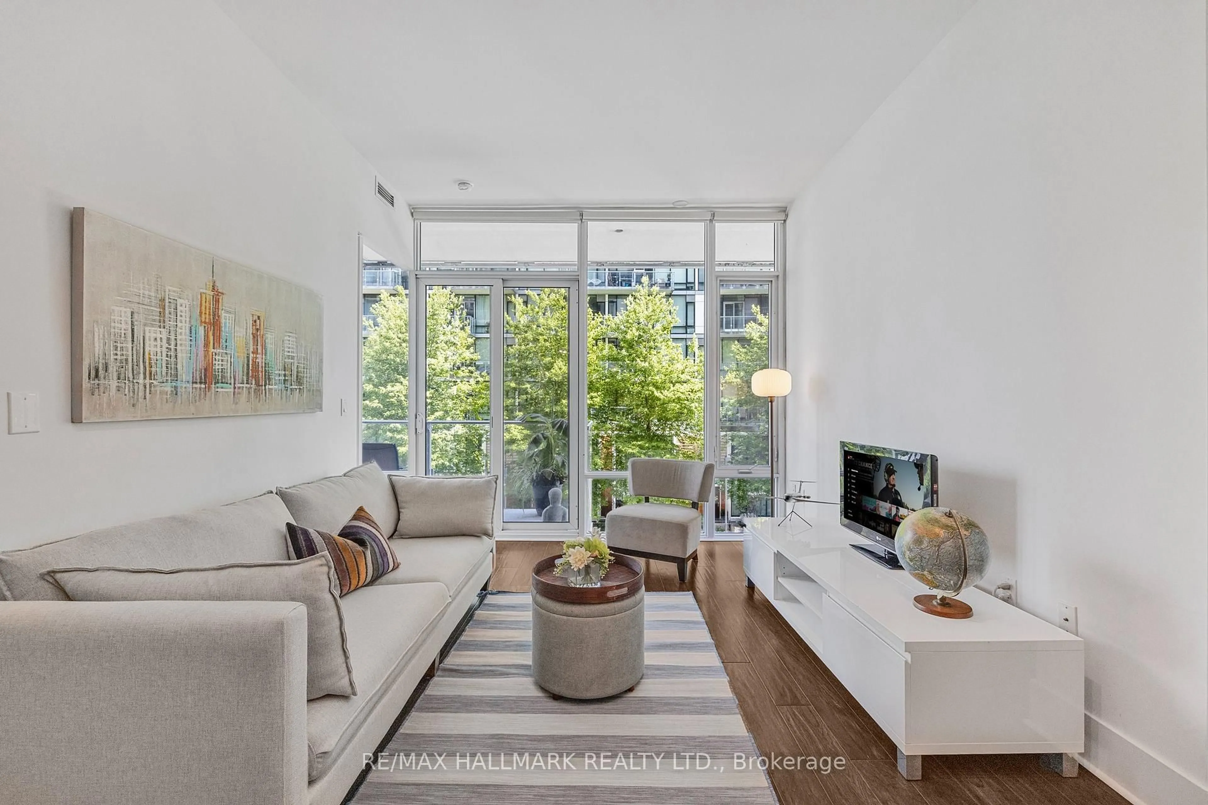 Living room with furniture, unknown for 29 Queens Quay #318, Toronto Ontario M5E 0A4
