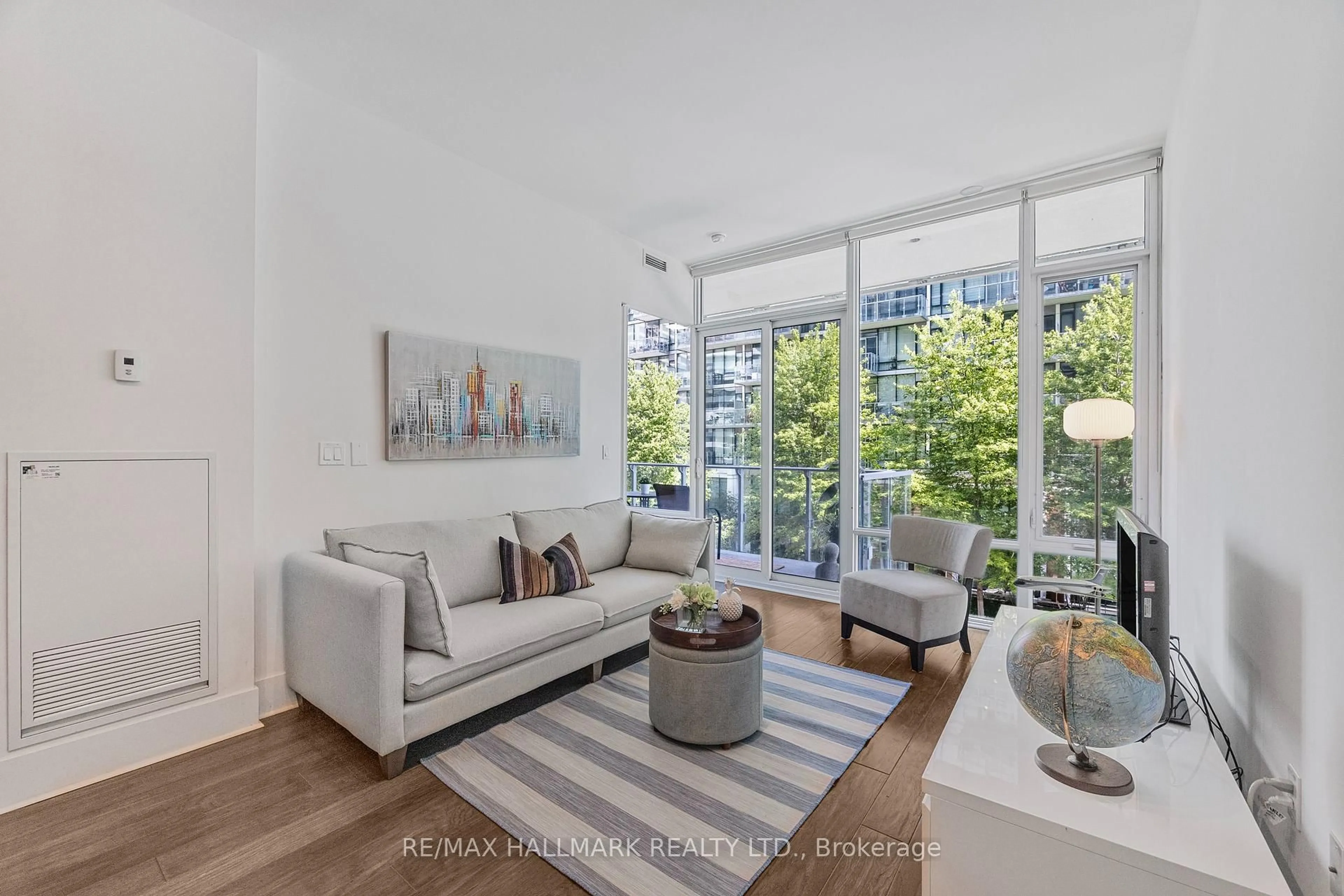 Living room with furniture, unknown for 29 Queens Quay #318, Toronto Ontario M5E 0A4