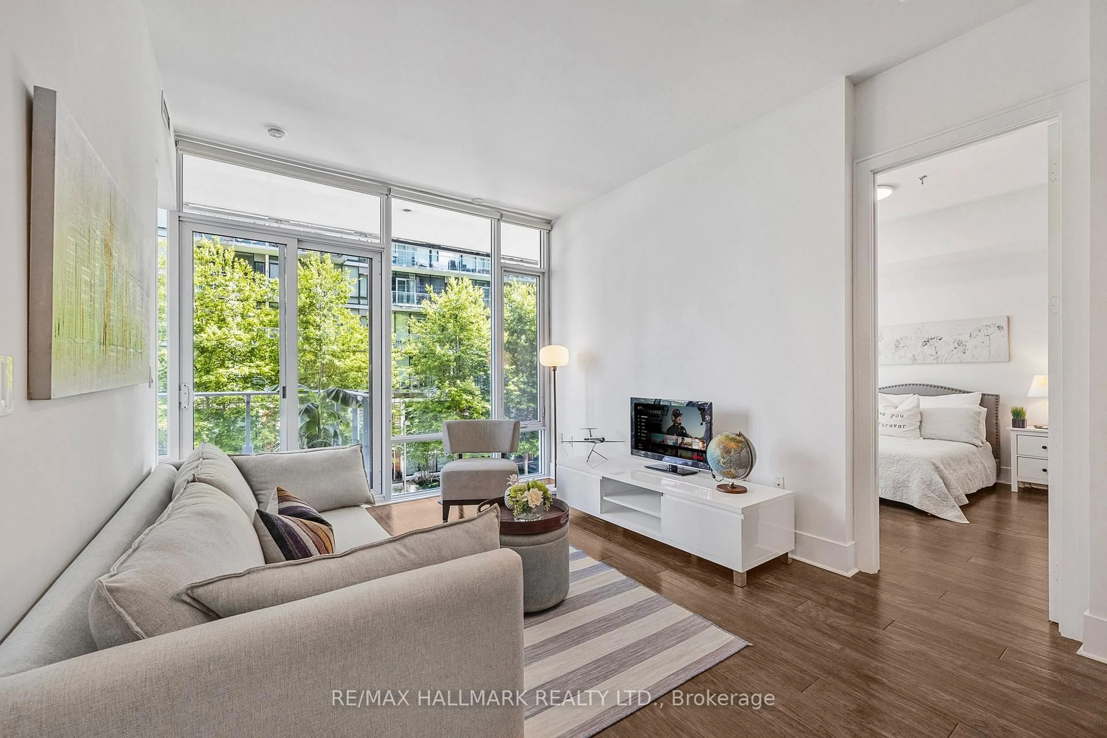 Living room with furniture, unknown for 29 Queens Quay #318, Toronto Ontario M5E 0A4