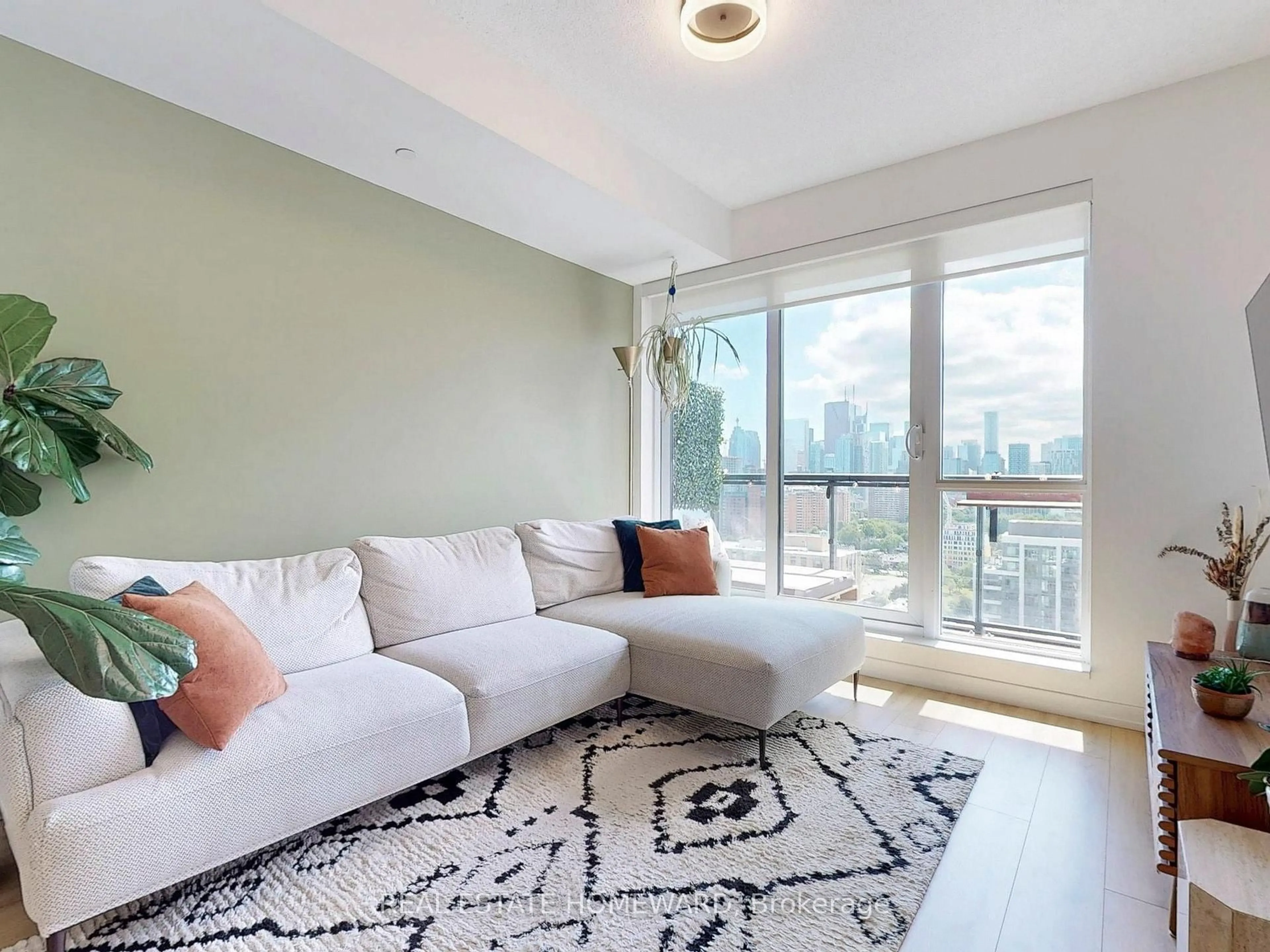 Living room with furniture, unknown for 55 Regent Park Blvd #1908, Toronto Ontario M5A 0C2