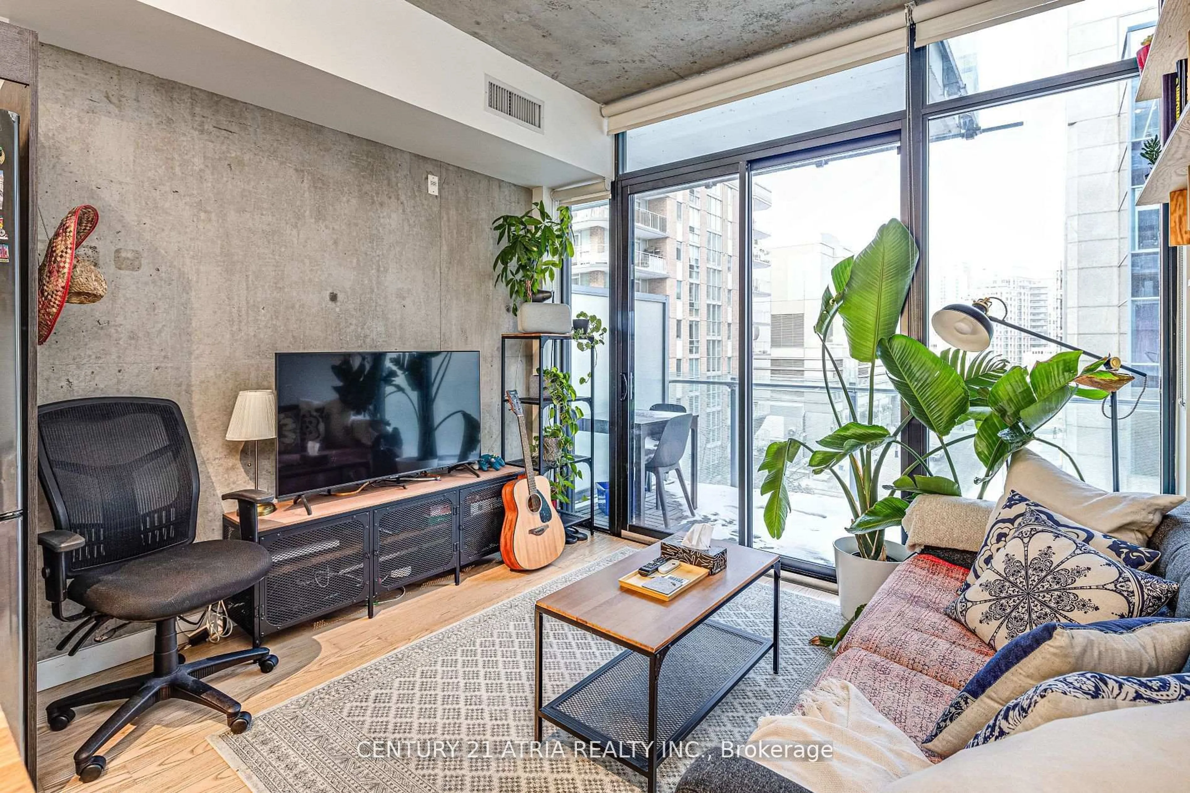 Living room with furniture, cement floor for 25 Stafford St #508, Toronto Ontario M5V 0G3