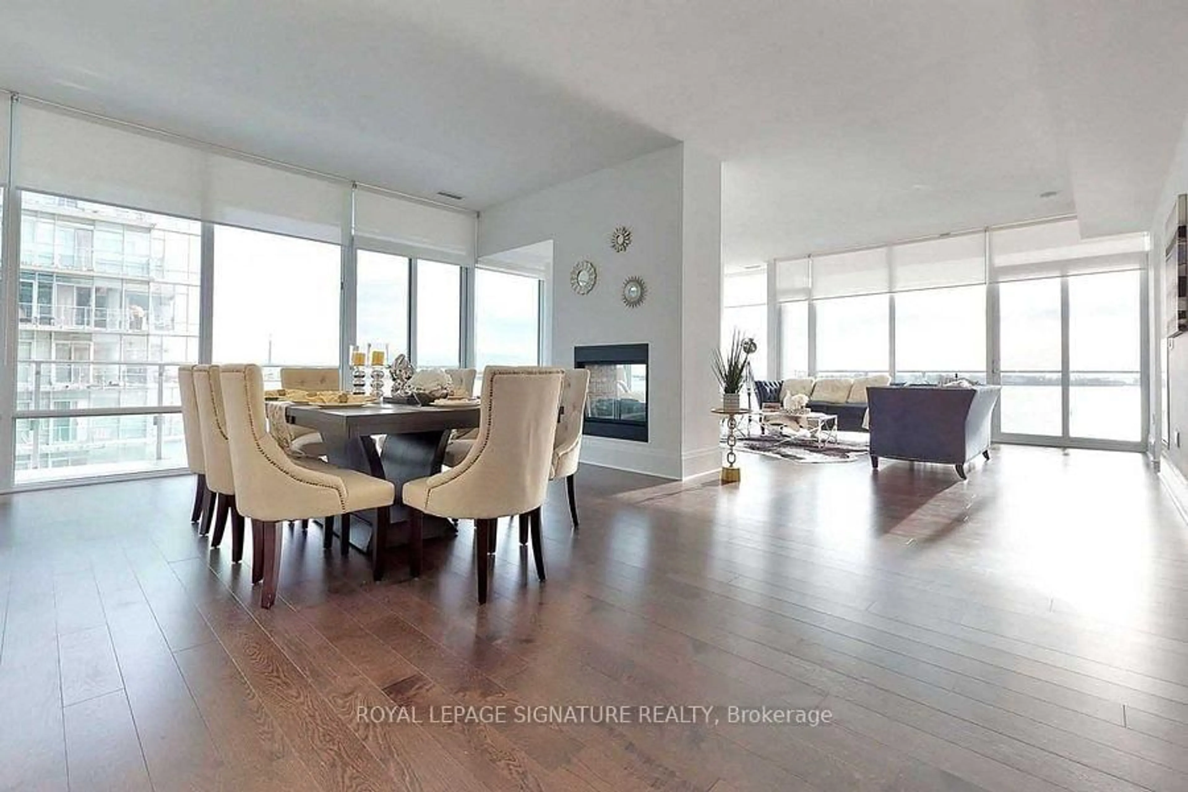 Living room with furniture, wood/laminate floor for 29 Queens Quay #707, Toronto Ontario M5E 0A4