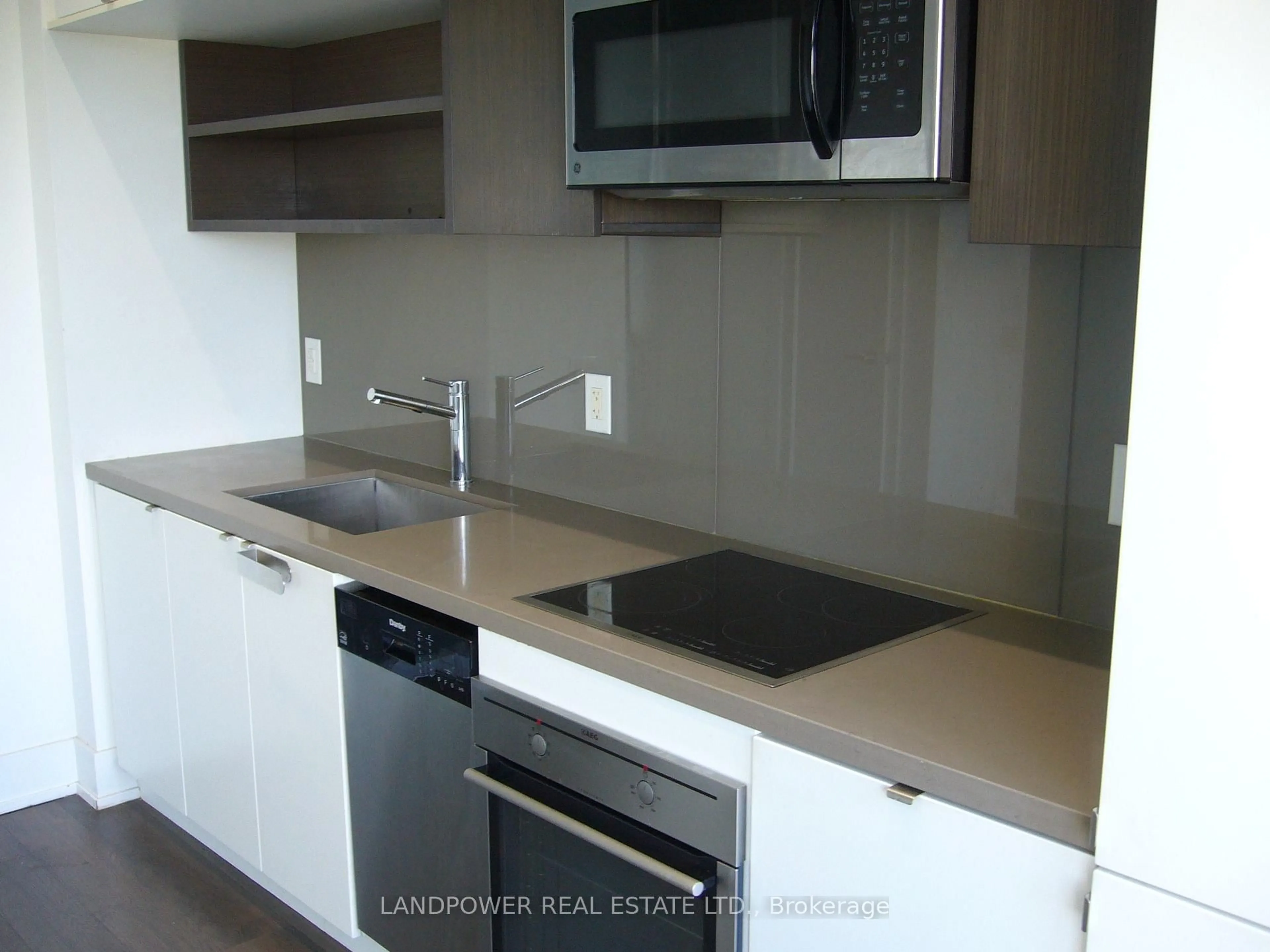 Standard kitchen, wood/laminate floor for 111 St Clair Ave #1427, Toronto Ontario M4V 1N5