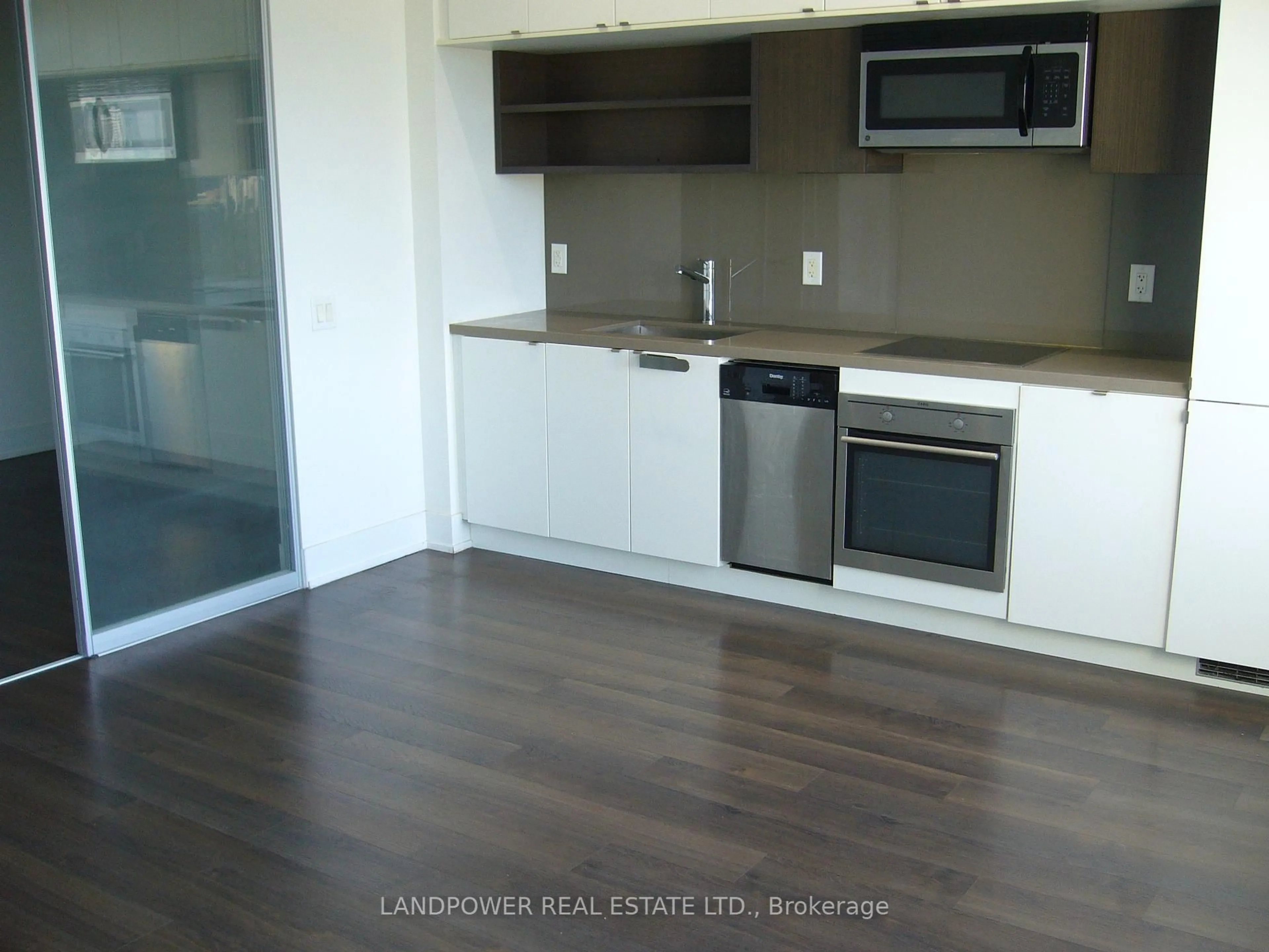 Standard kitchen, wood/laminate floor for 111 St Clair Ave #1427, Toronto Ontario M4V 1N5