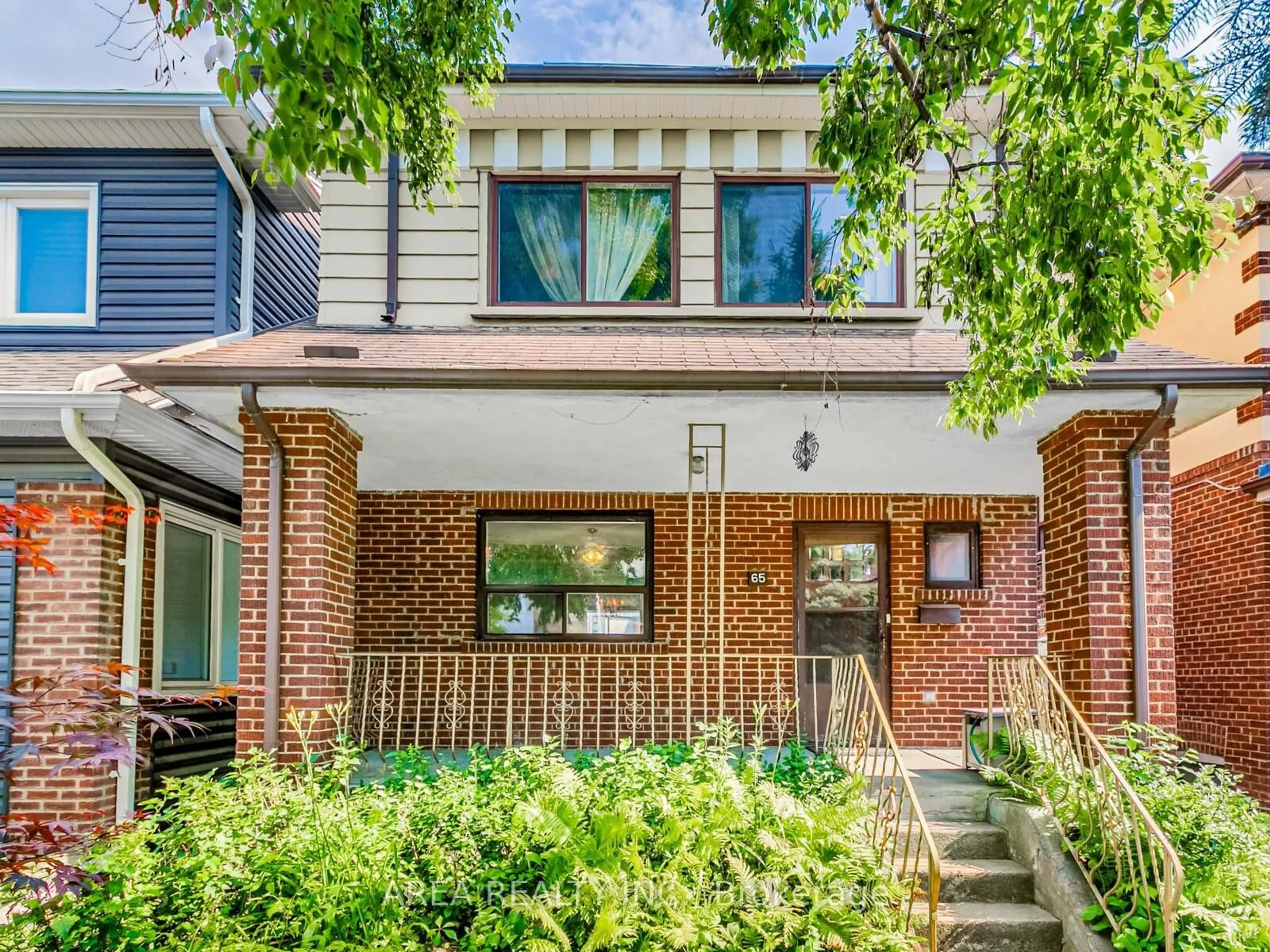 Home with brick exterior material, street for 65 St Annes Rd, Toronto Ontario M6J 2C4