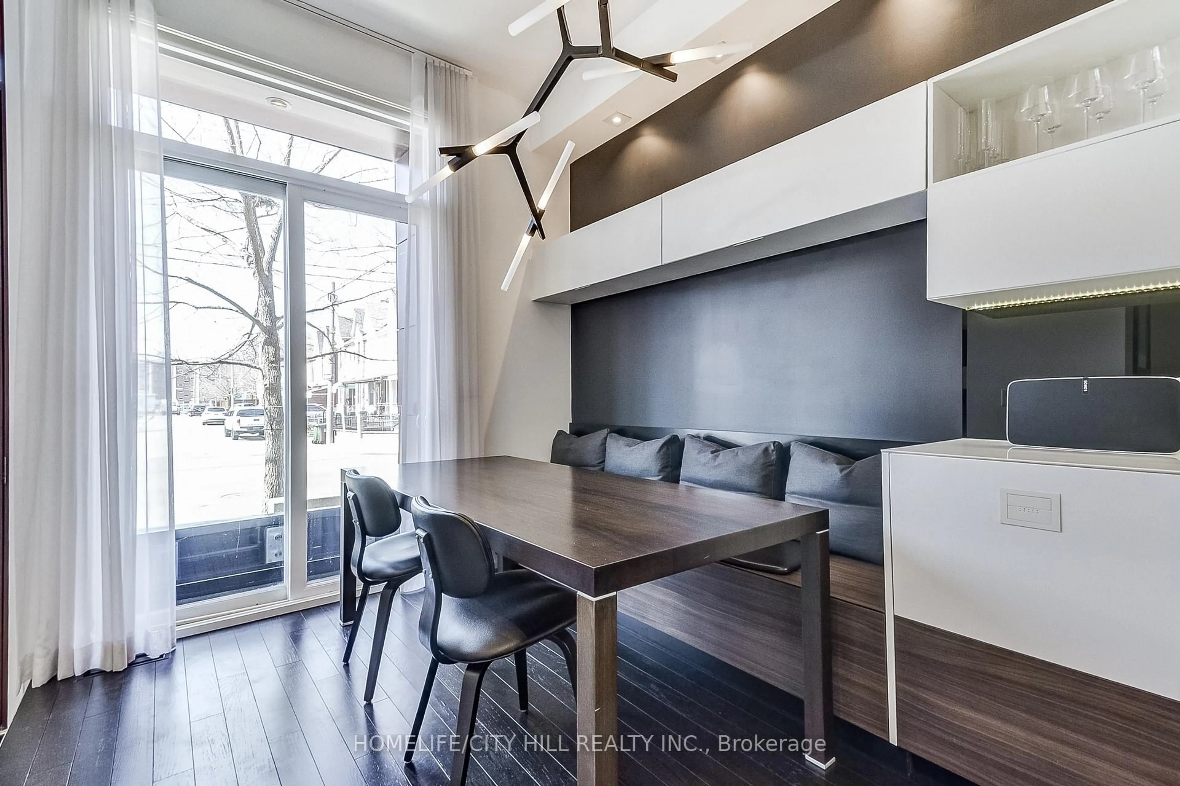 Contemporary kitchen, wood/laminate floor for 249 Claremont St, Toronto Ontario M6J 2N1