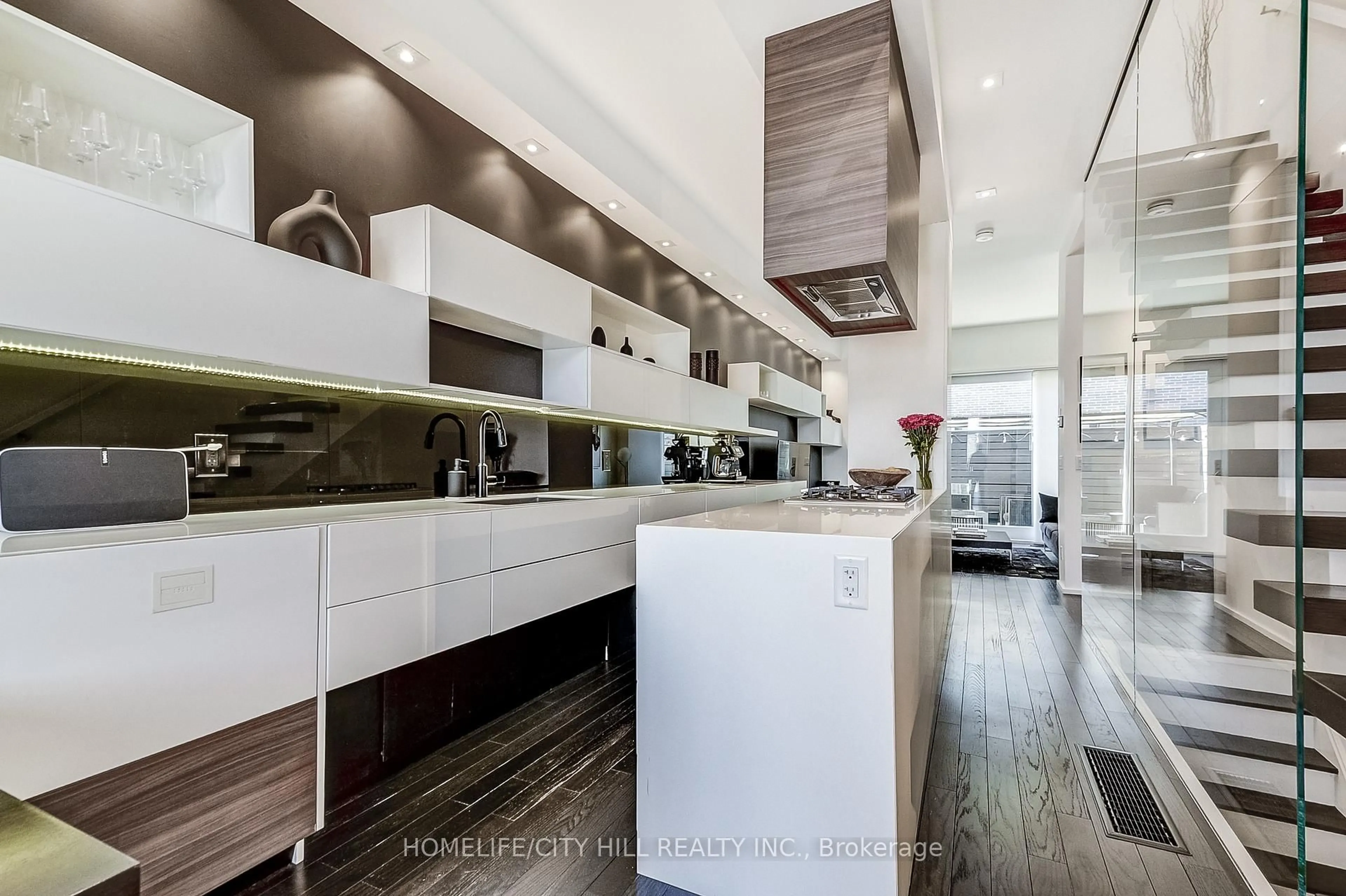 Contemporary kitchen, wood/laminate floor for 249 Claremont St, Toronto Ontario M6J 2N1