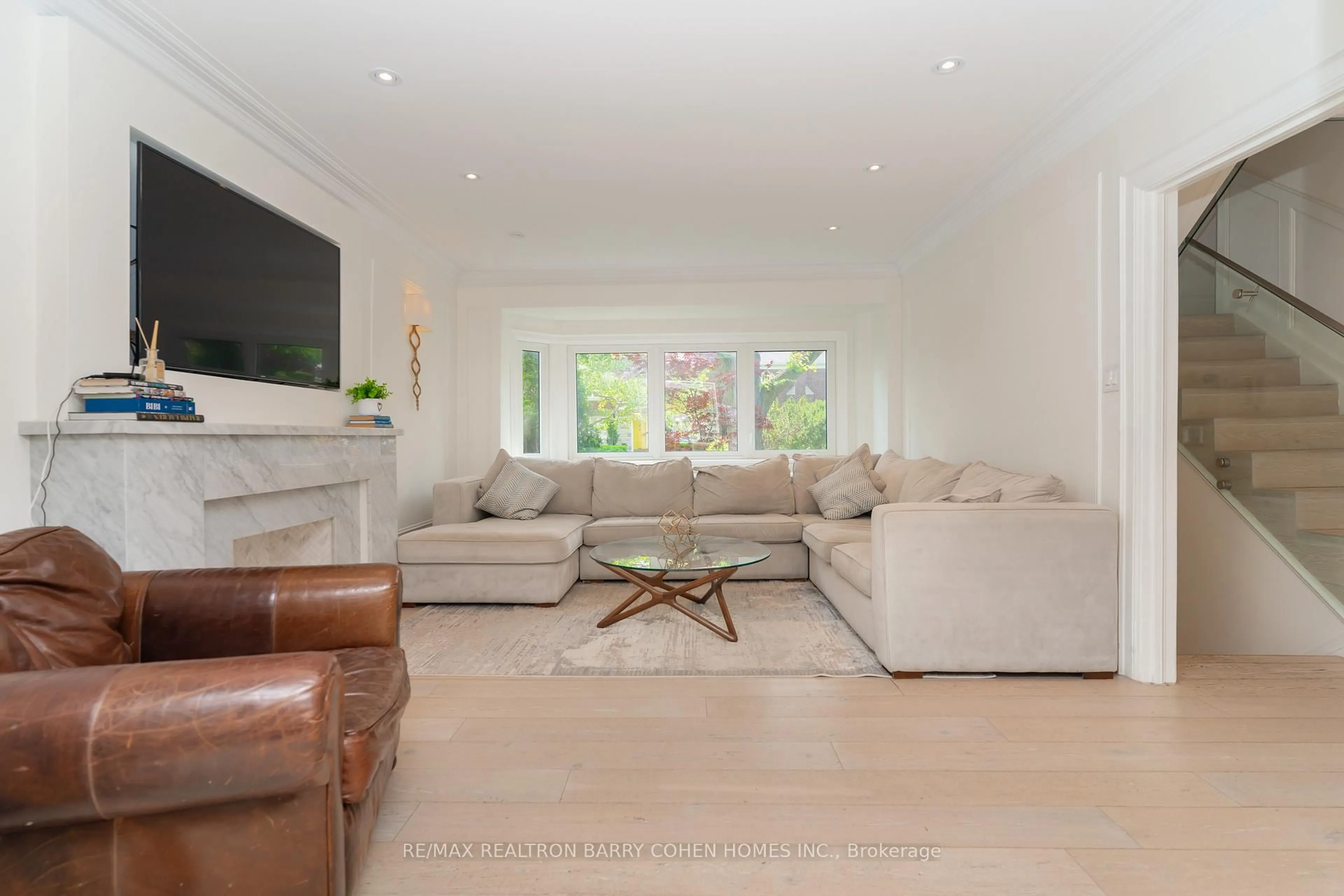 Living room with furniture, ceramic/tile floor for 7 Glenarden Rd, Toronto Ontario M6C 3J8