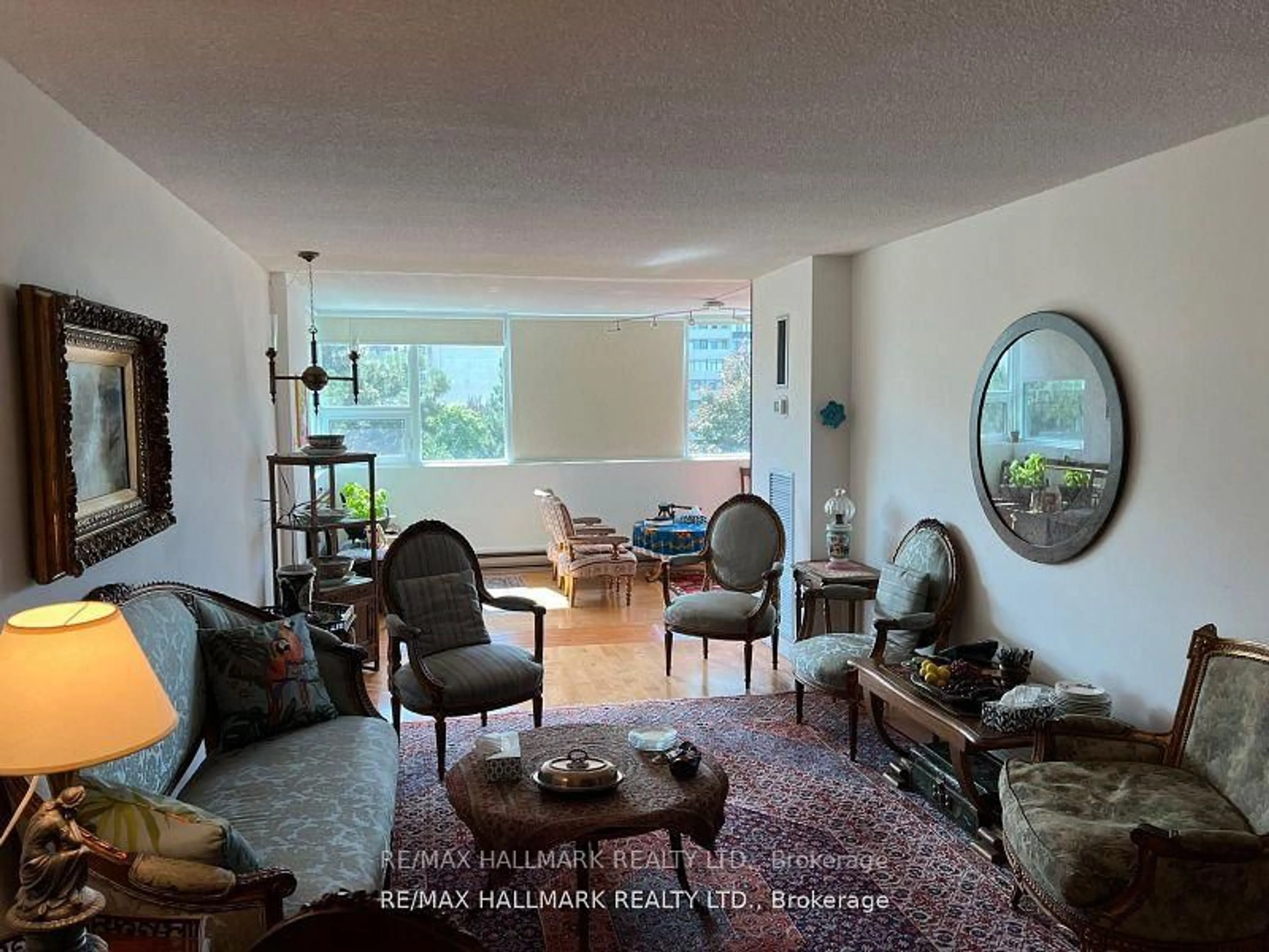 Living room with furniture, unknown for 3303 Don Mills Rd #508, Toronto Ontario M2J 4T6