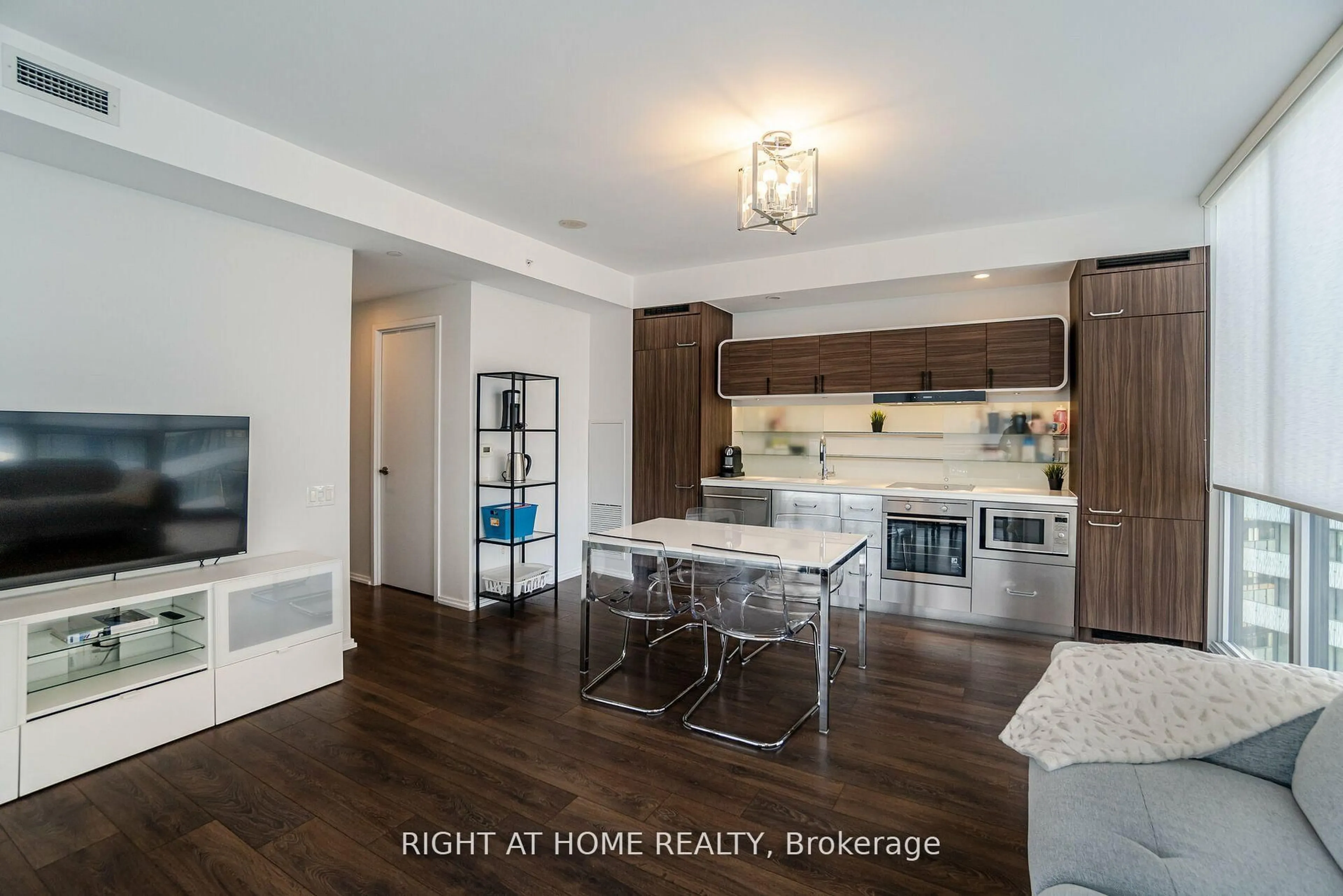 Open concept kitchen, wood/laminate floor for 45 Charles St #3910, Toronto Ontario M4Y 1S2