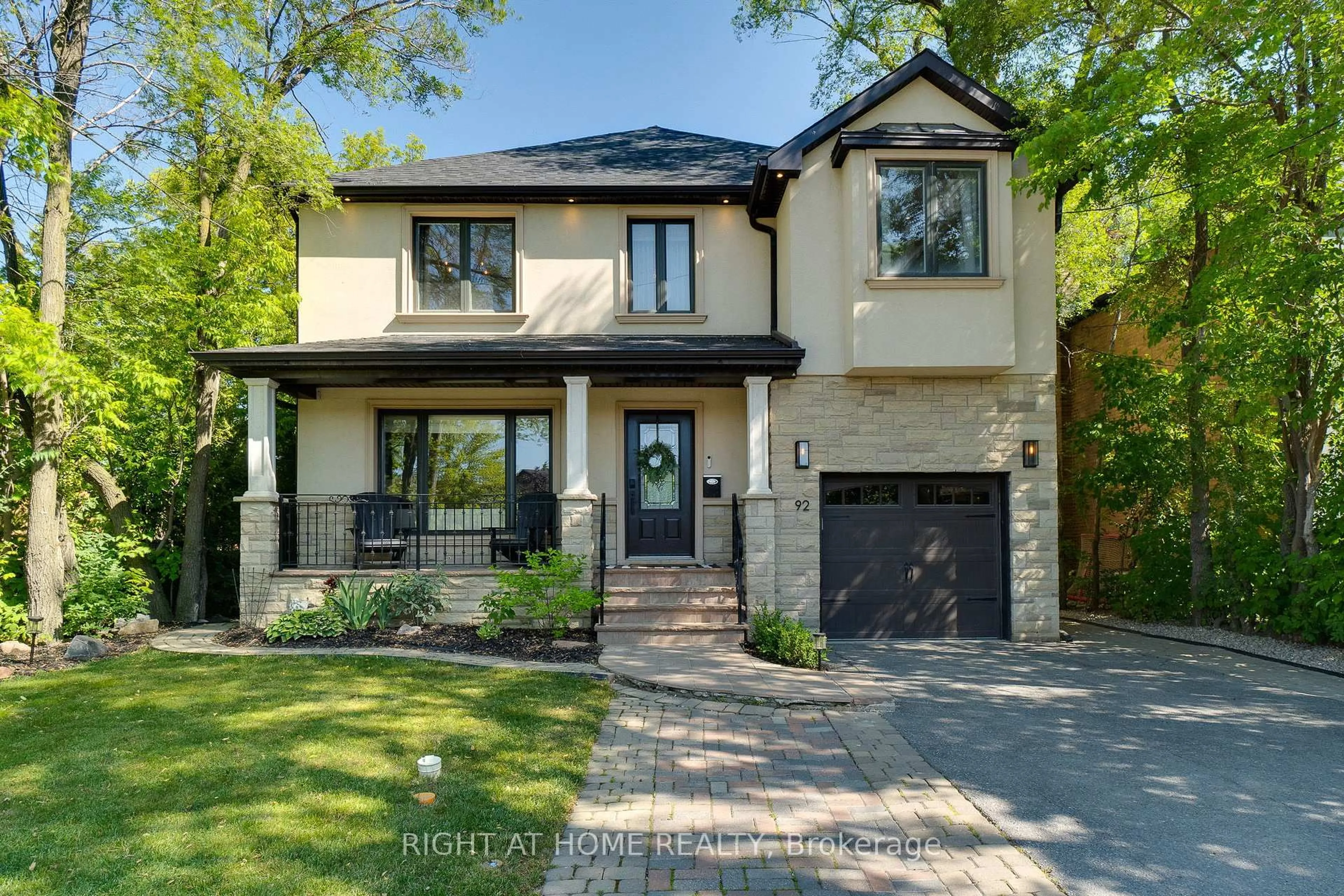 Home with brick exterior material, street for 92 Ridgevale Dr, Toronto Ontario M6A 1L3