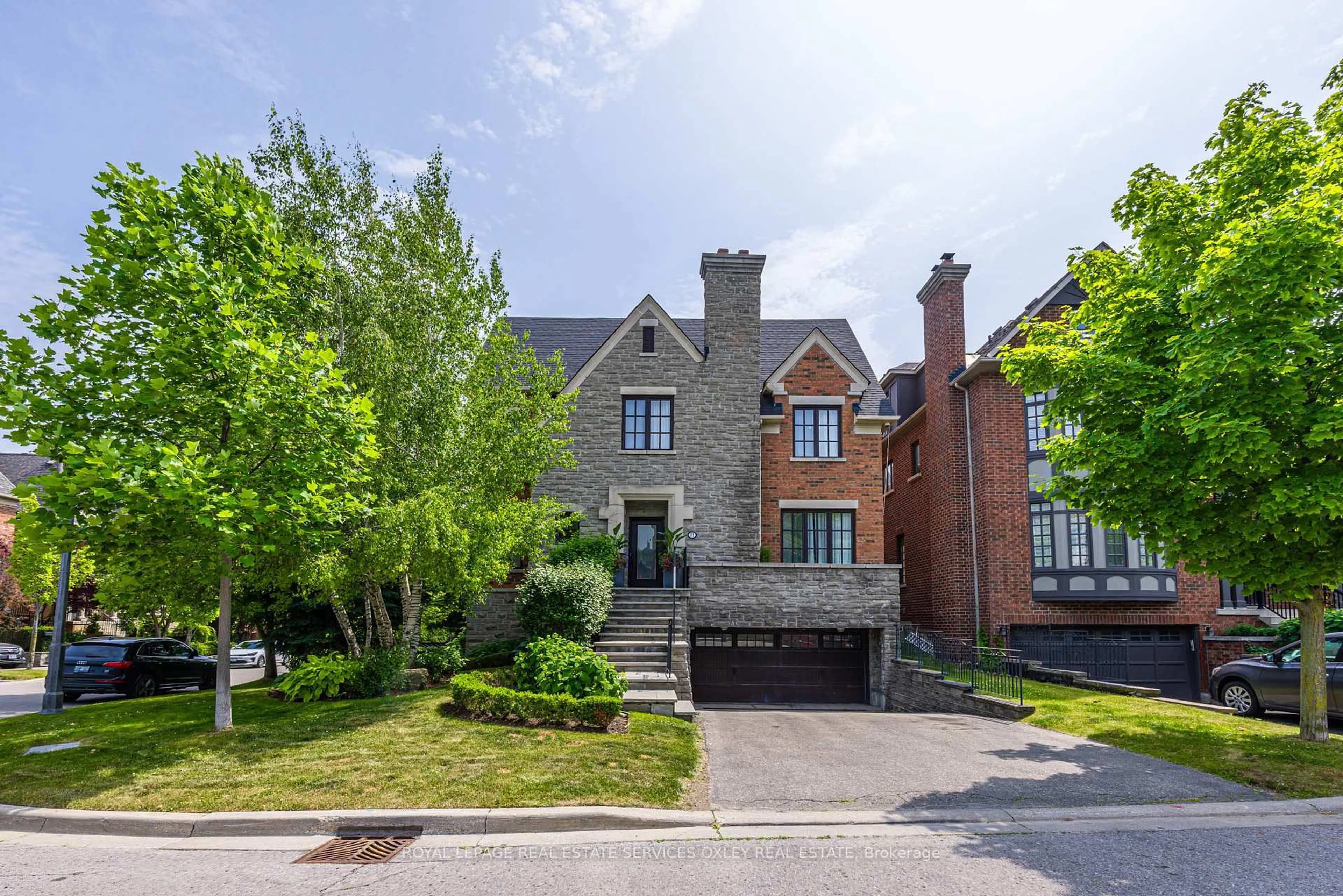 Home with brick exterior material, street for 11 True Davidson Dr, Toronto Ontario M4W 3X2