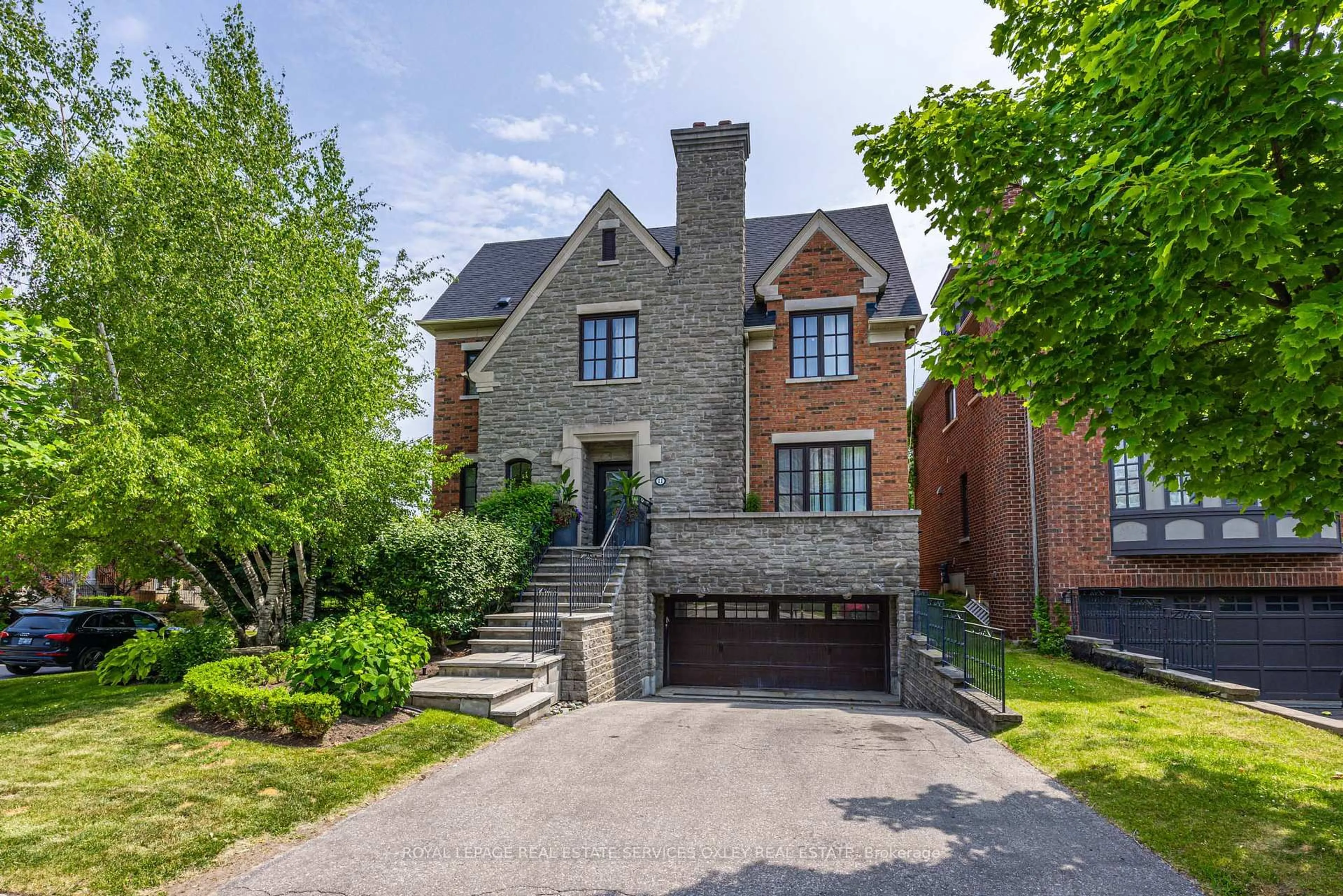 Home with brick exterior material, street for 11 True Davidson Dr, Toronto Ontario M4W 3X2