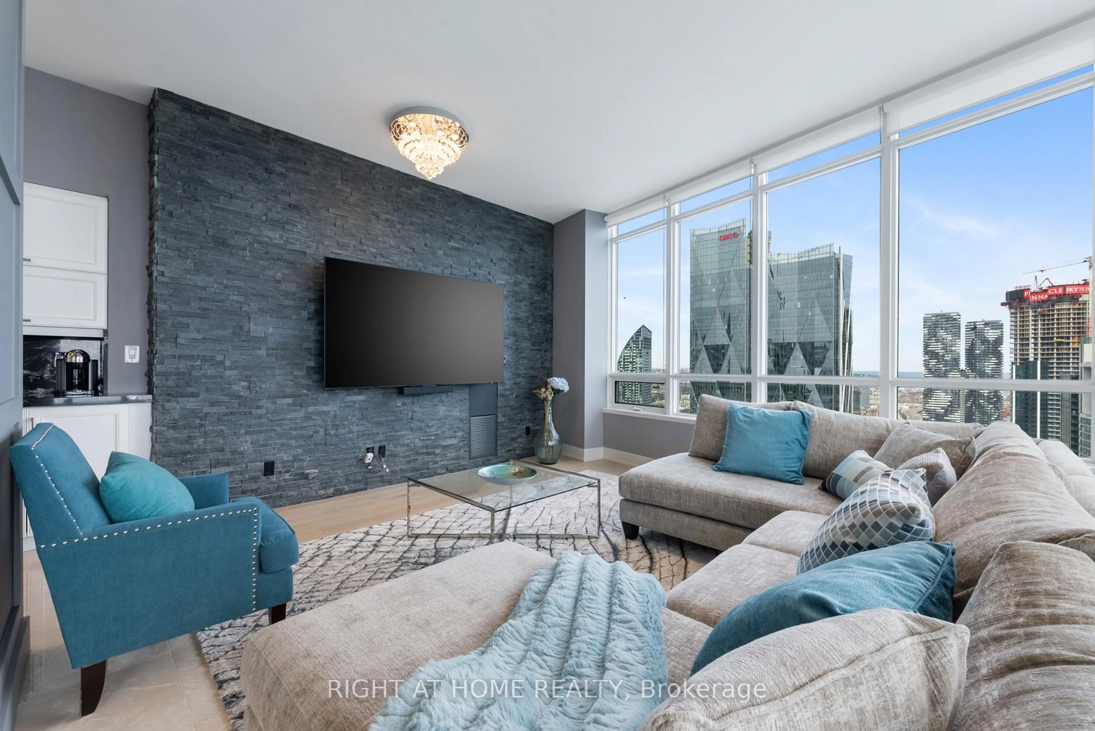 Living room with furniture, unknown for 65 Bremner Blvd #5104, Toronto Ontario M5J 0A7