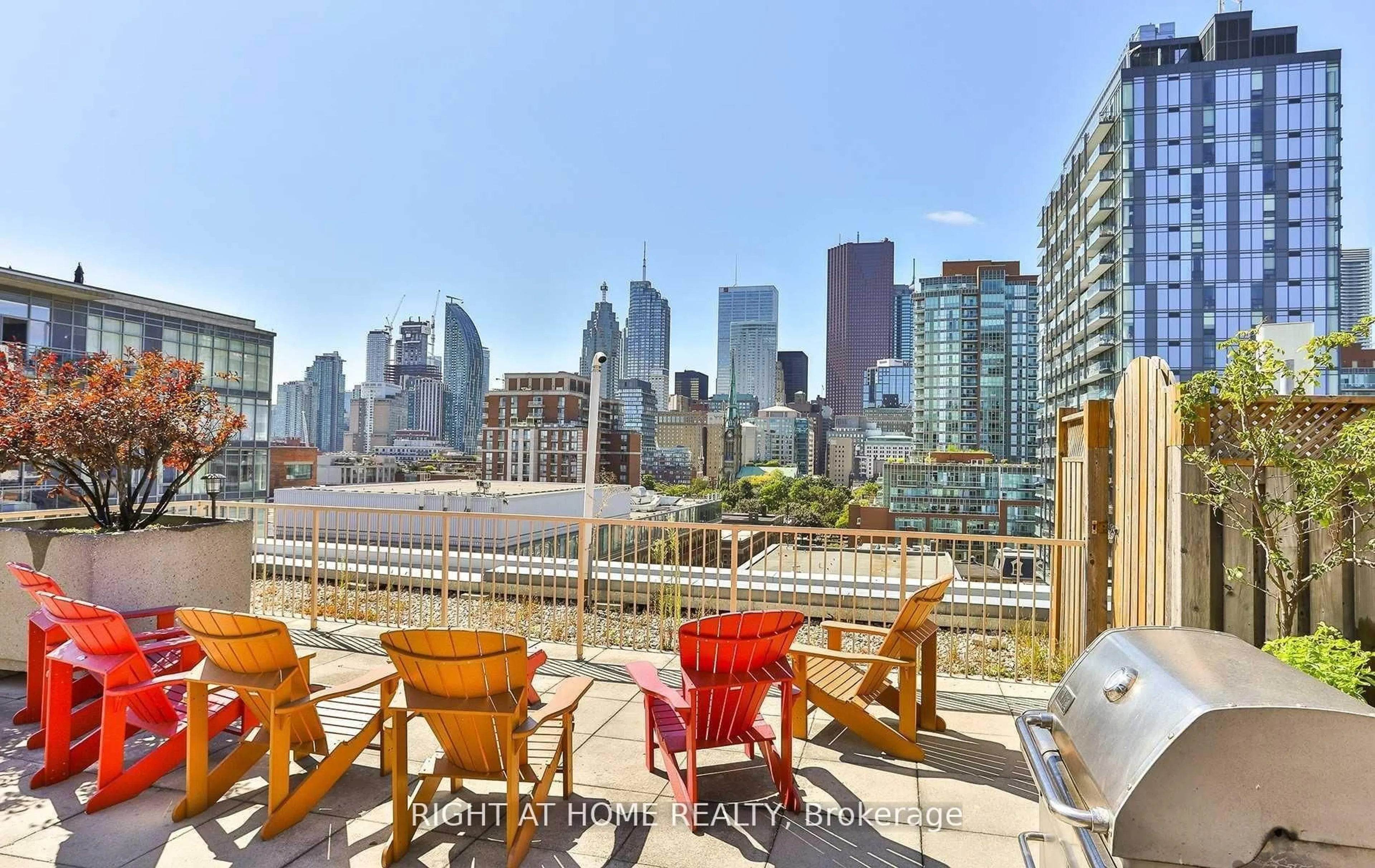 Patio, city buildings view from balcony for 330 Adelaide St #308, Toronto Ontario M5A 4S9