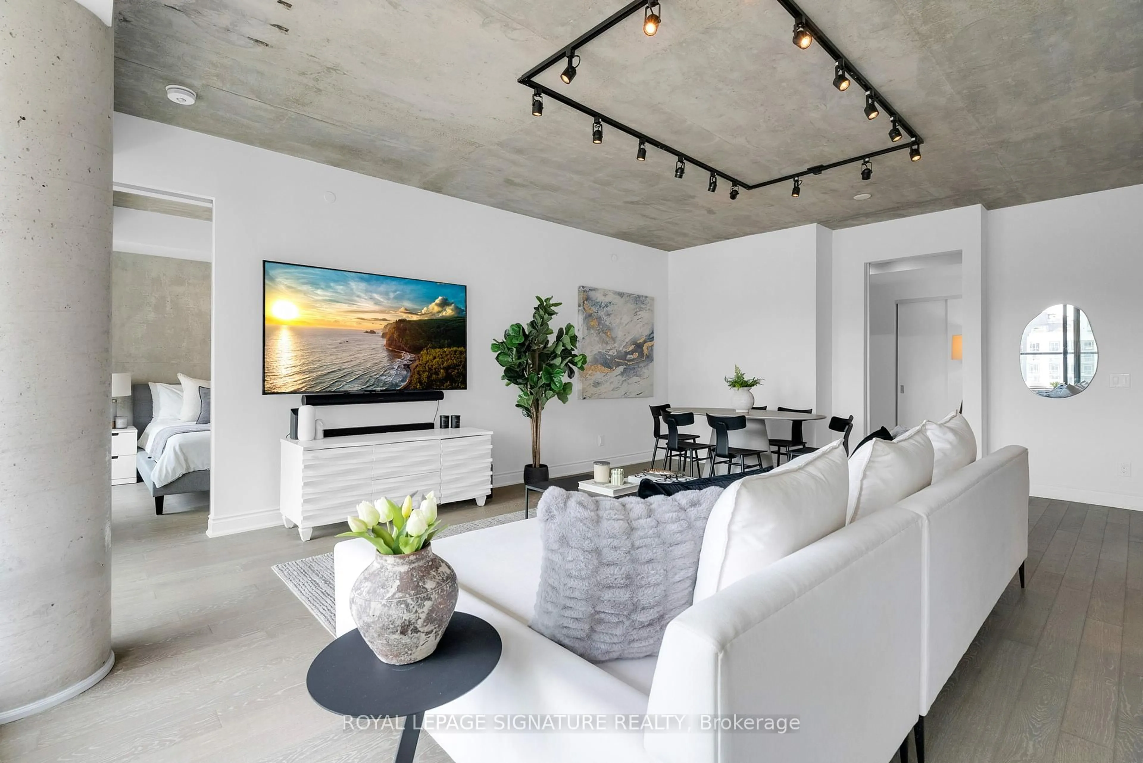 Living room with furniture, cement floor for 608 Richmond St #1105, Toronto Ontario M5V 0N9