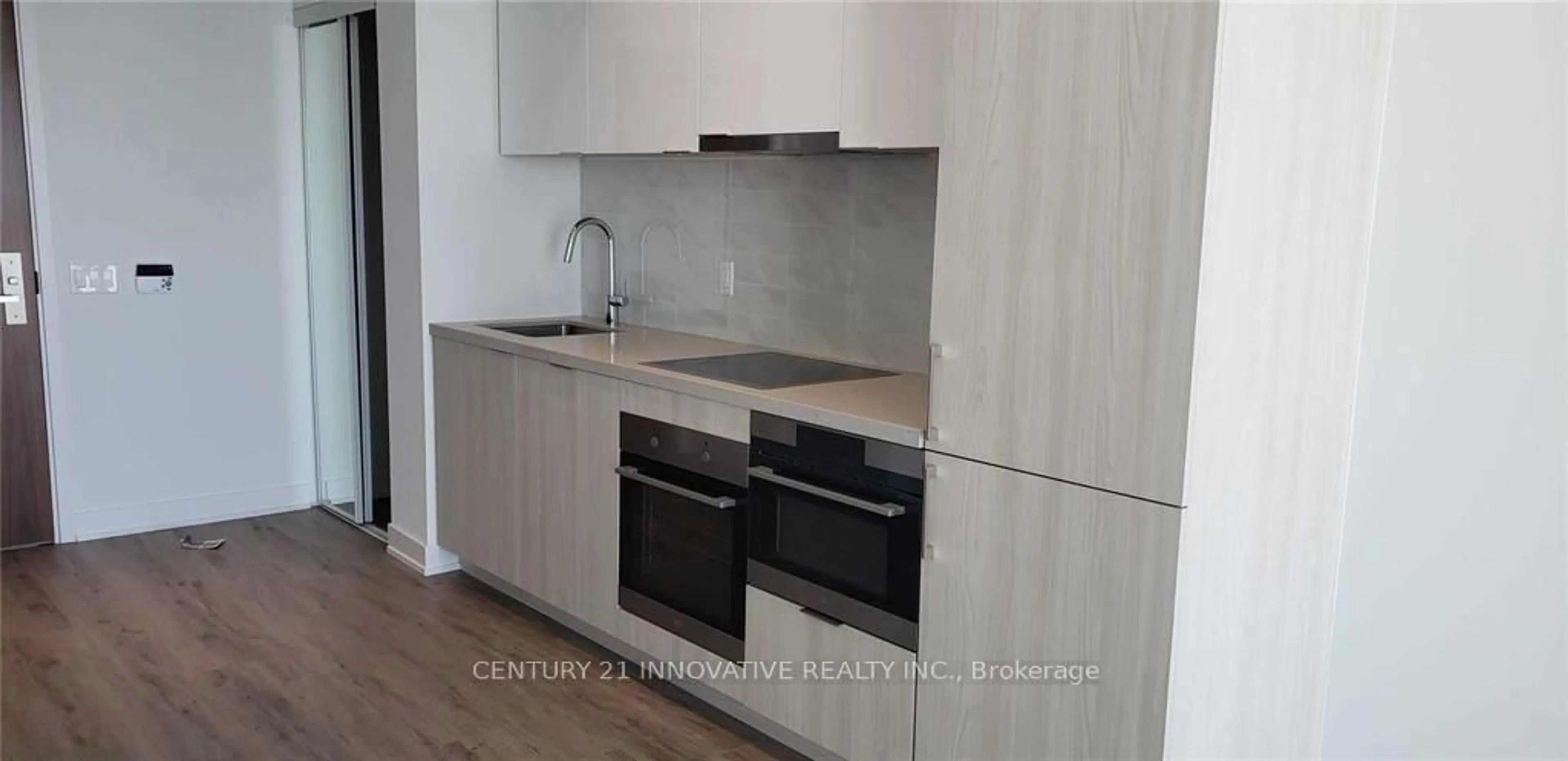 Standard kitchen, wood/laminate floor for 15 Queens Quay #2403, Toronto Ontario M5E 0A4