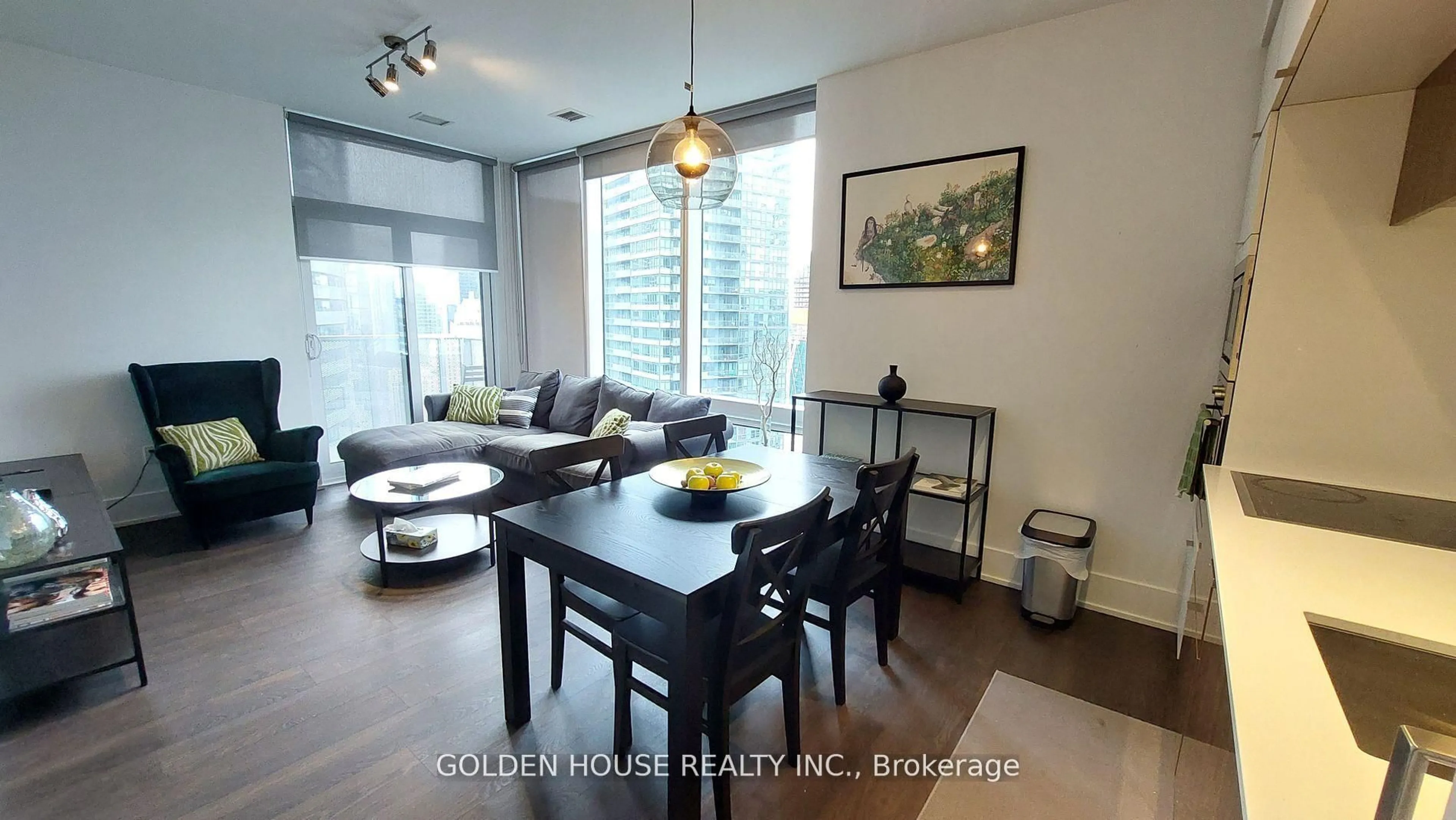 Living room with furniture, wood/laminate floor for 10 York St #3803, Toronto Ontario M5J 0E1