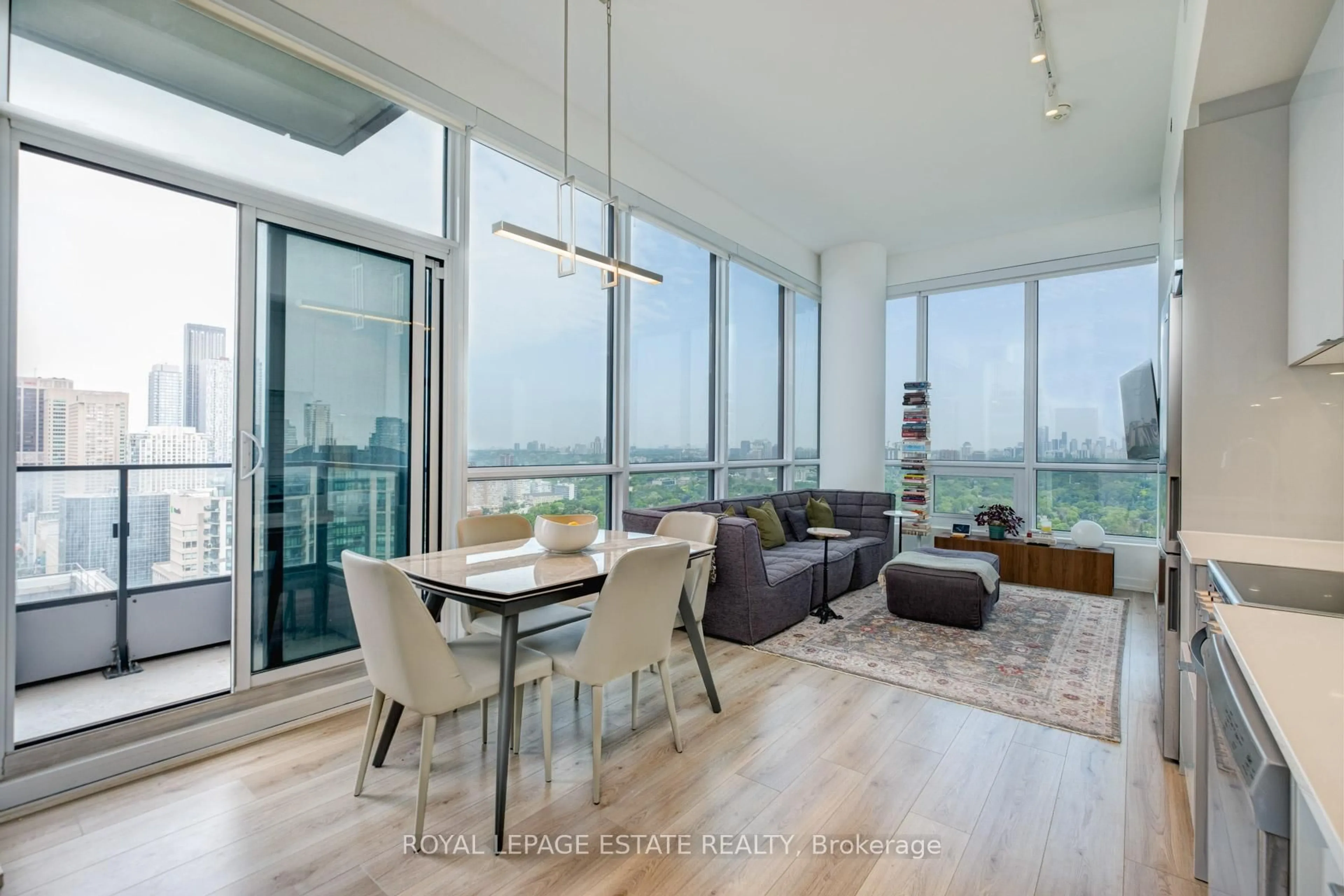 Living room with furniture, wood/laminate floor for 395 Bloor St #2805, Toronto Ontario M4W 0B4