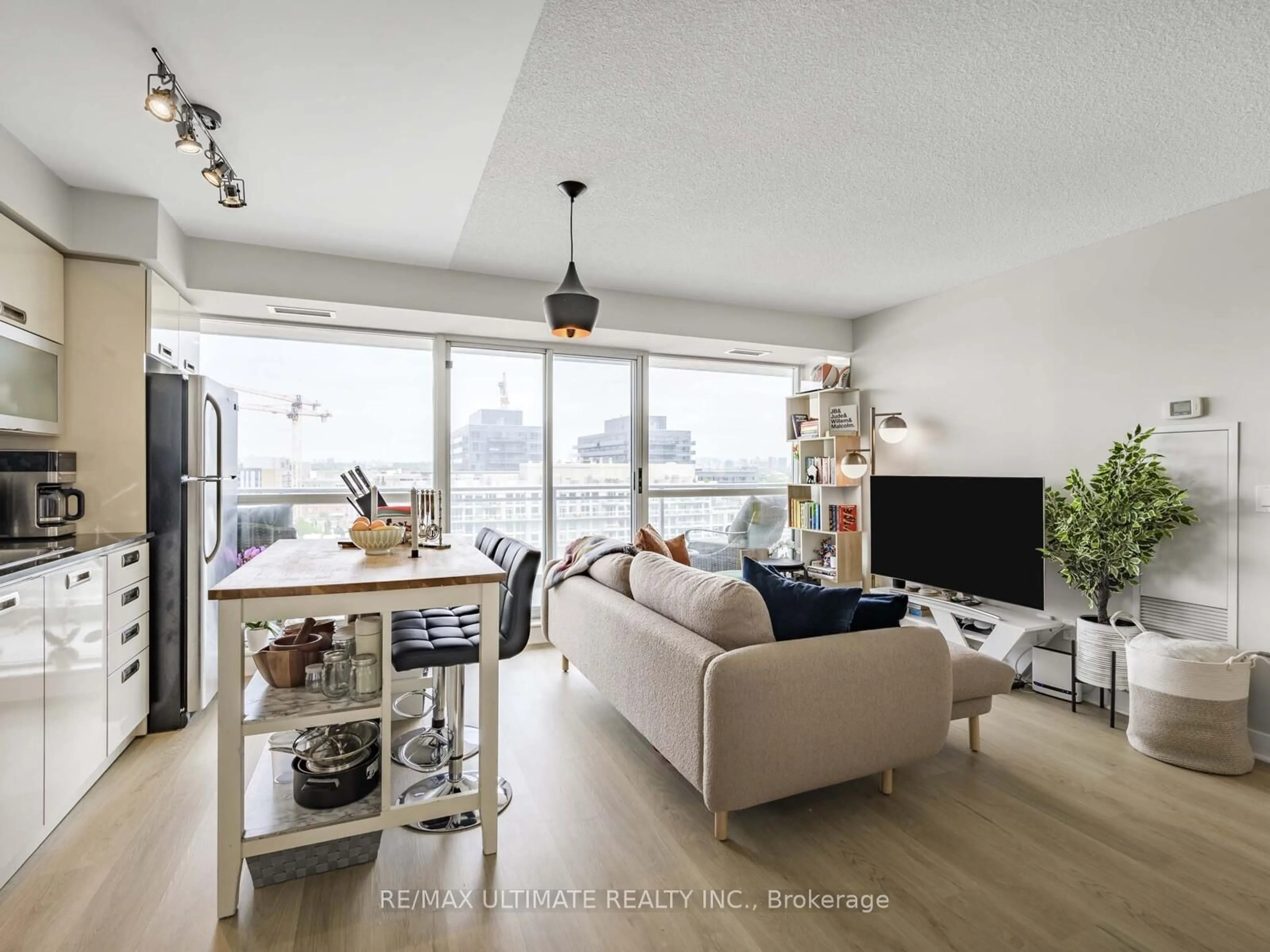 Living room with furniture, wood/laminate floor for 100 Western Battery Rd #1108, Toronto Ontario M6K 3S2