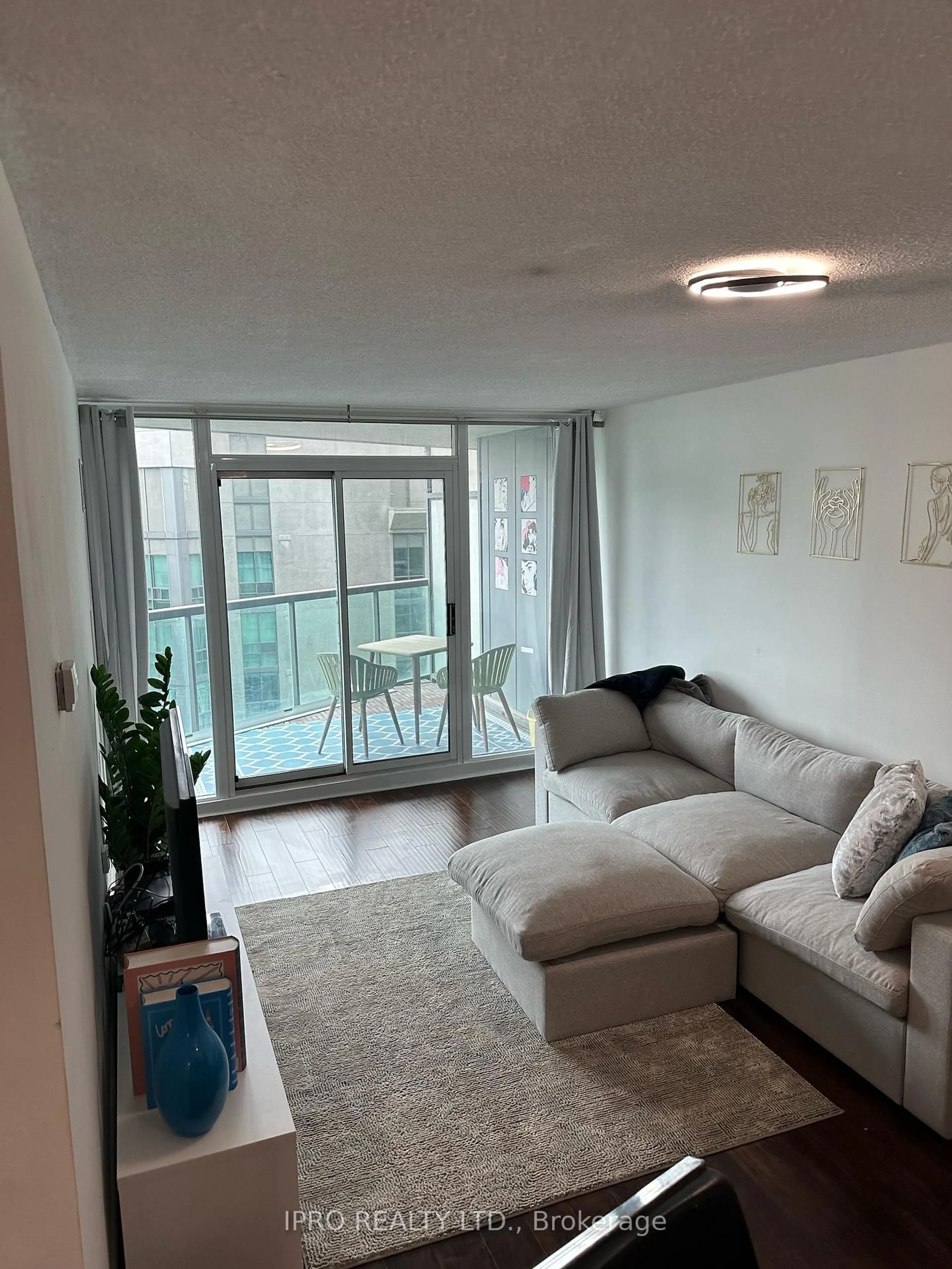 Living room with furniture, unknown for 30 Grand Trunk Cres #2015, Toronto Ontario M5J 3A4