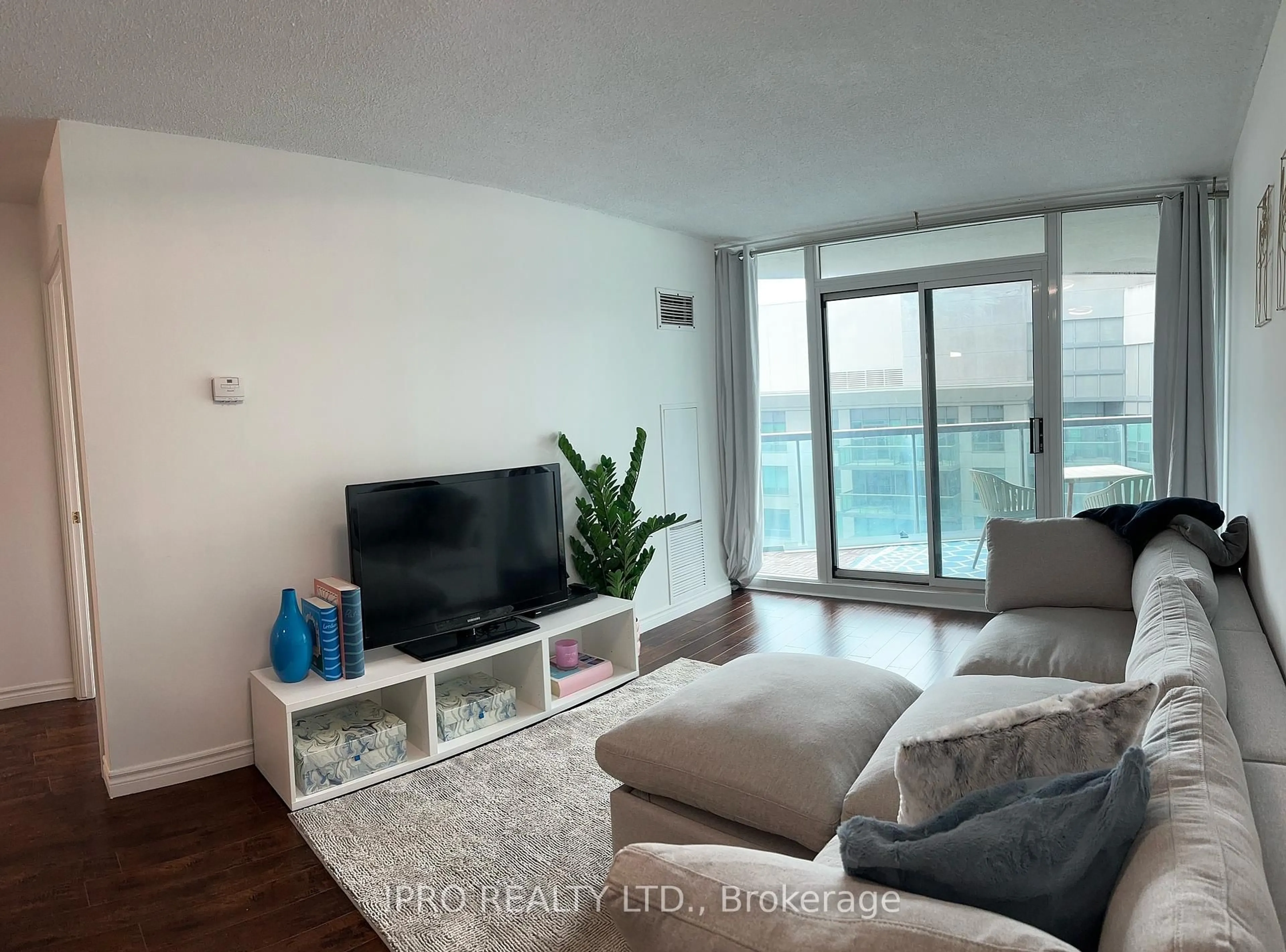 Living room with furniture, unknown for 30 Grand Trunk Cres #2015, Toronto Ontario M5J 3A4