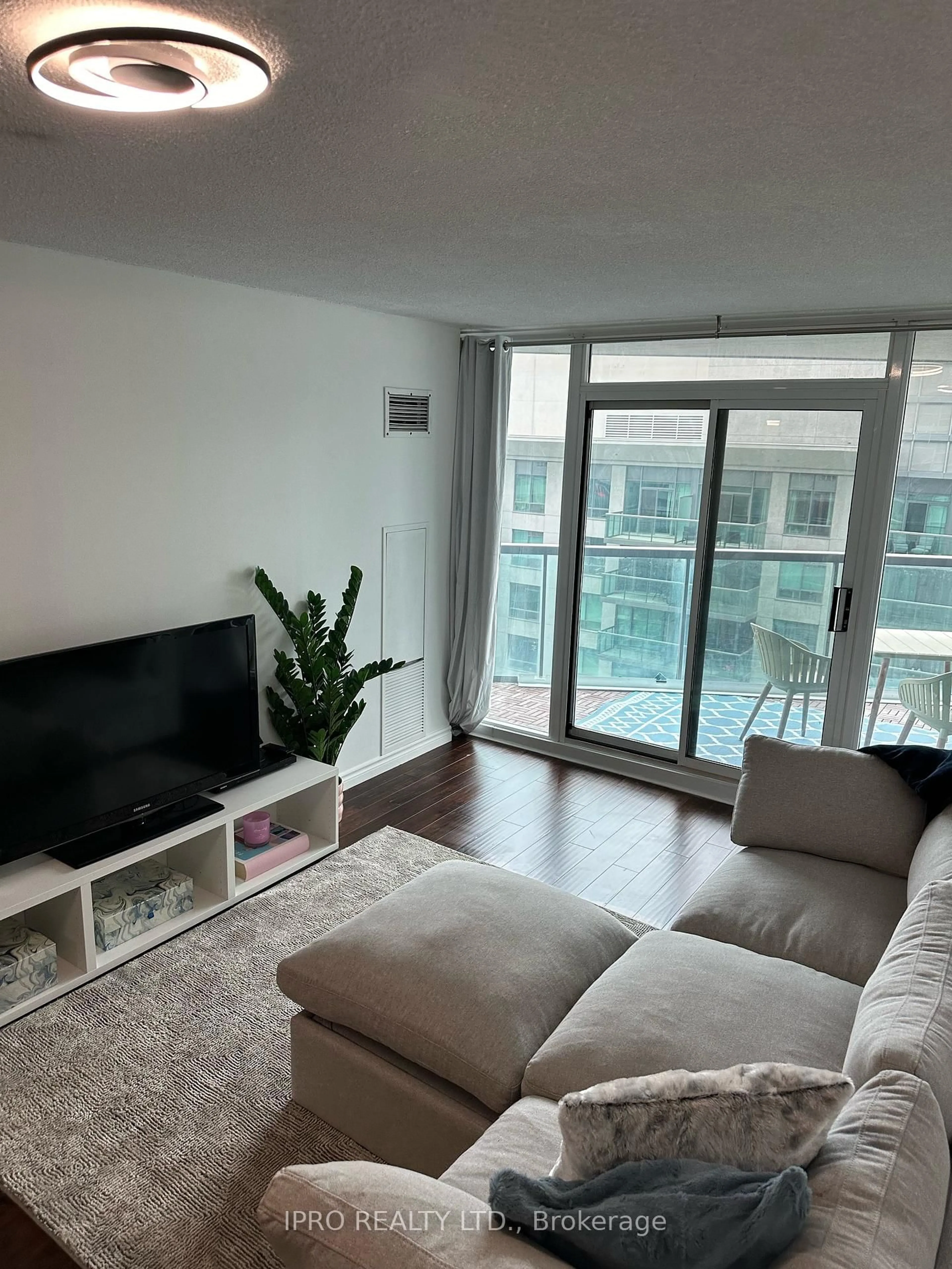 Living room with furniture, unknown for 30 Grand Trunk Cres #2015, Toronto Ontario M5J 3A4
