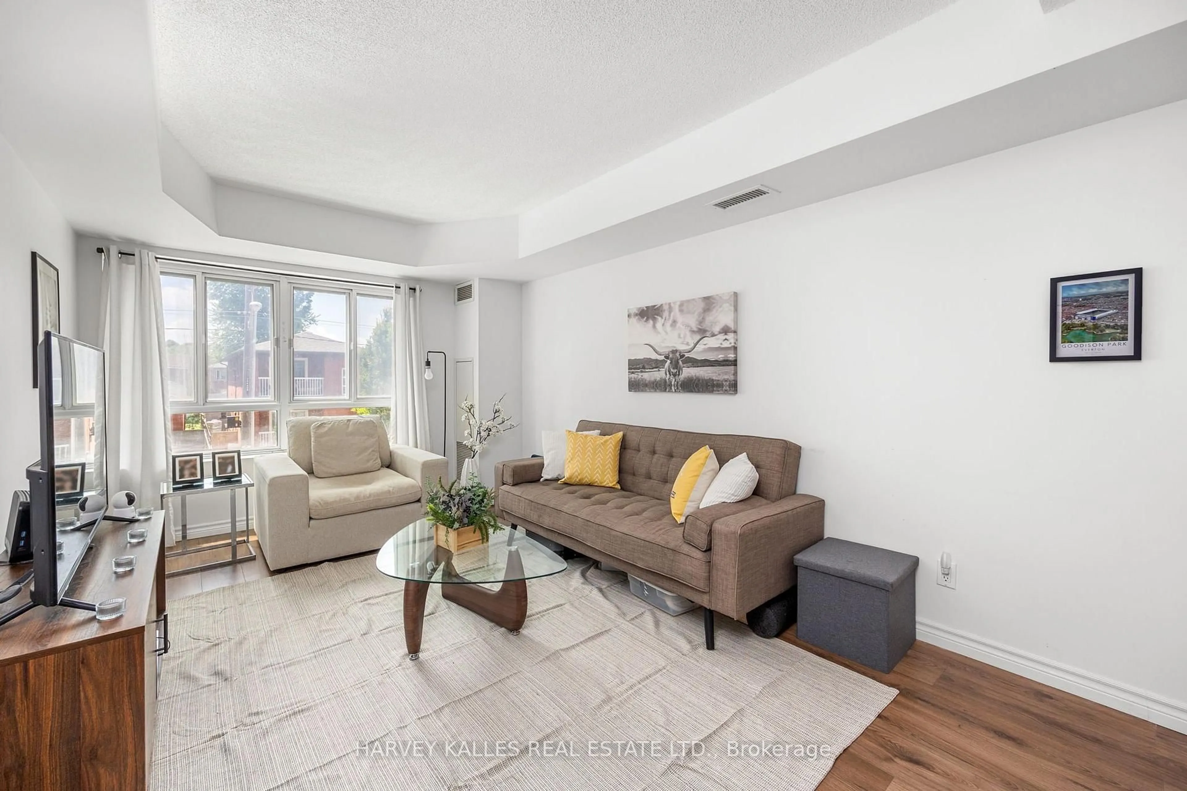 Living room with furniture, unknown for 15 Maplewood Ave #212, Toronto Ontario M6C 4B4