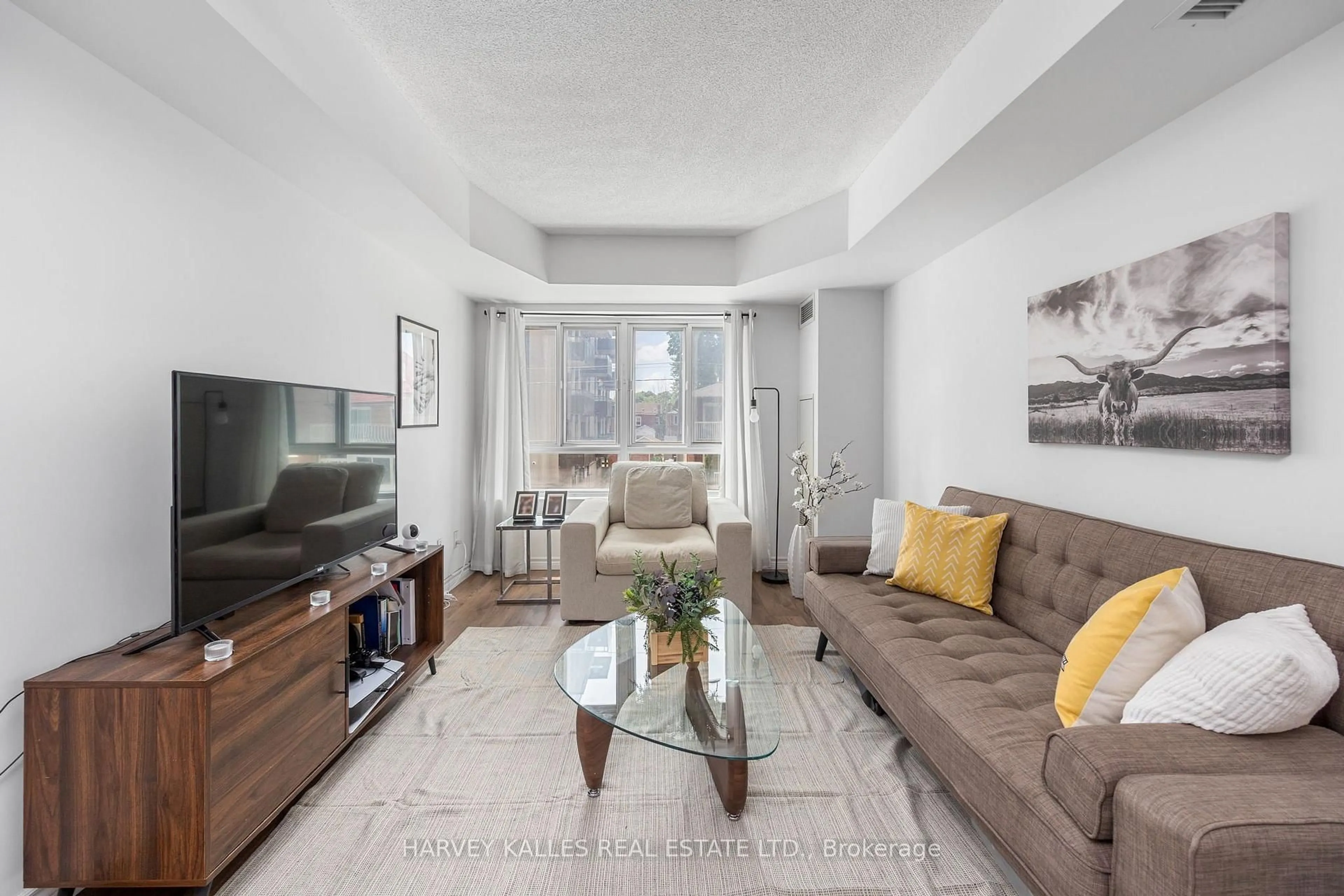 Living room with furniture, unknown for 15 Maplewood Ave #212, Toronto Ontario M6C 4B4