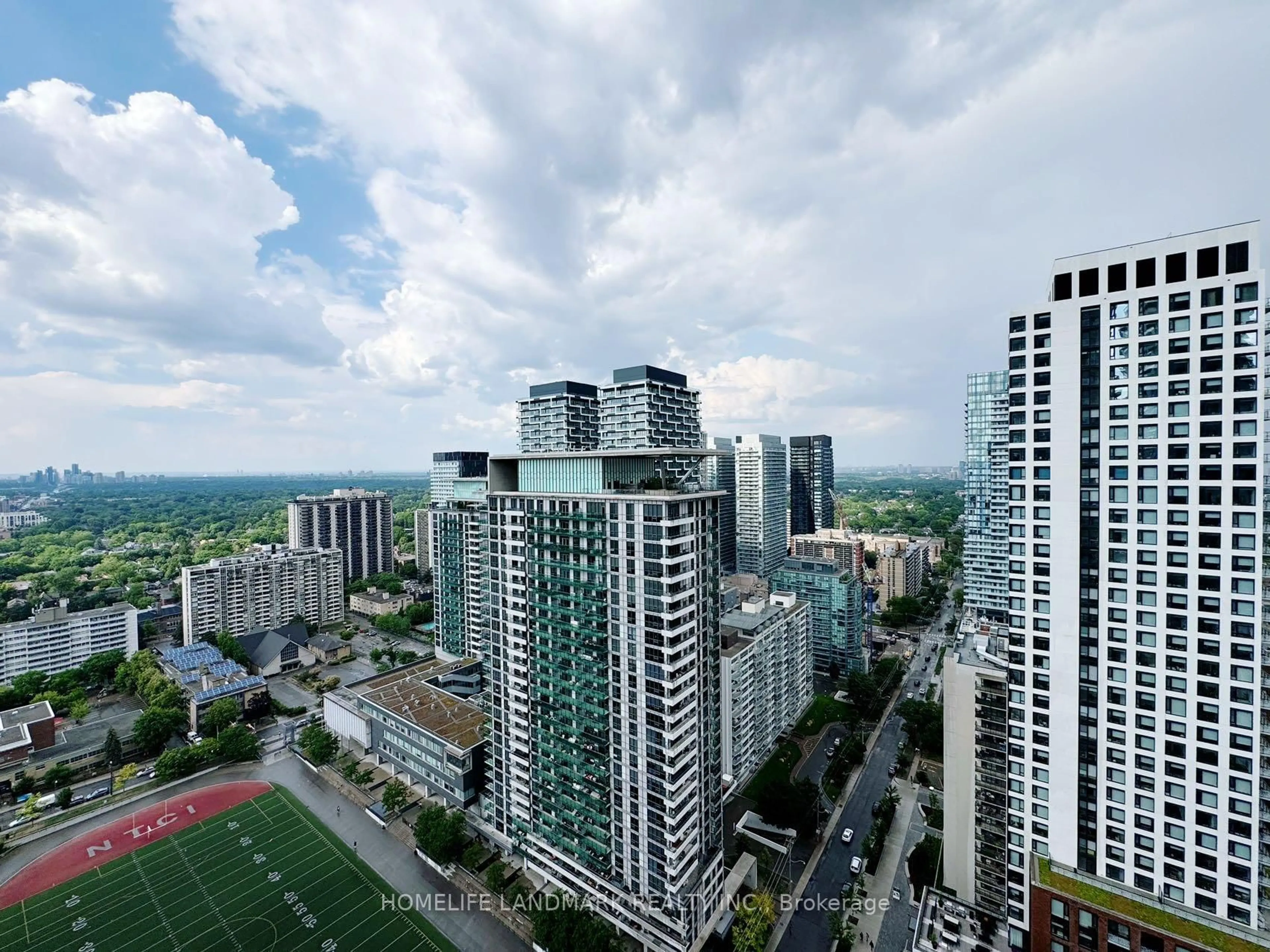 A pic from outside/outdoor area/front of a property/back of a property/a pic from drone, city buildings view from balcony for 39 Roehampton Ave #2810, Toronto Ontario M4P 1P9