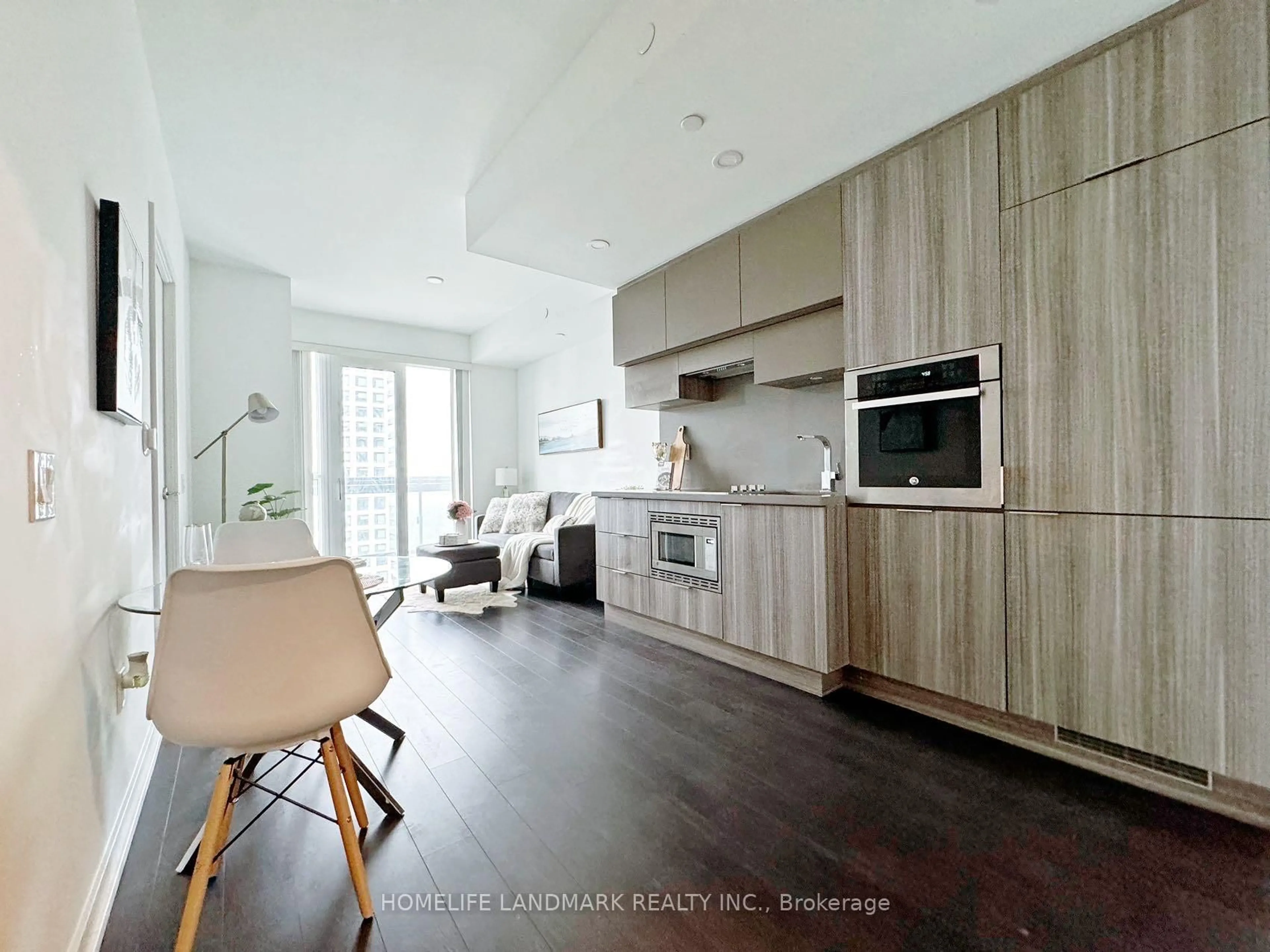 Open concept kitchen, wood/laminate floor for 39 Roehampton Ave #2810, Toronto Ontario M4P 1P9