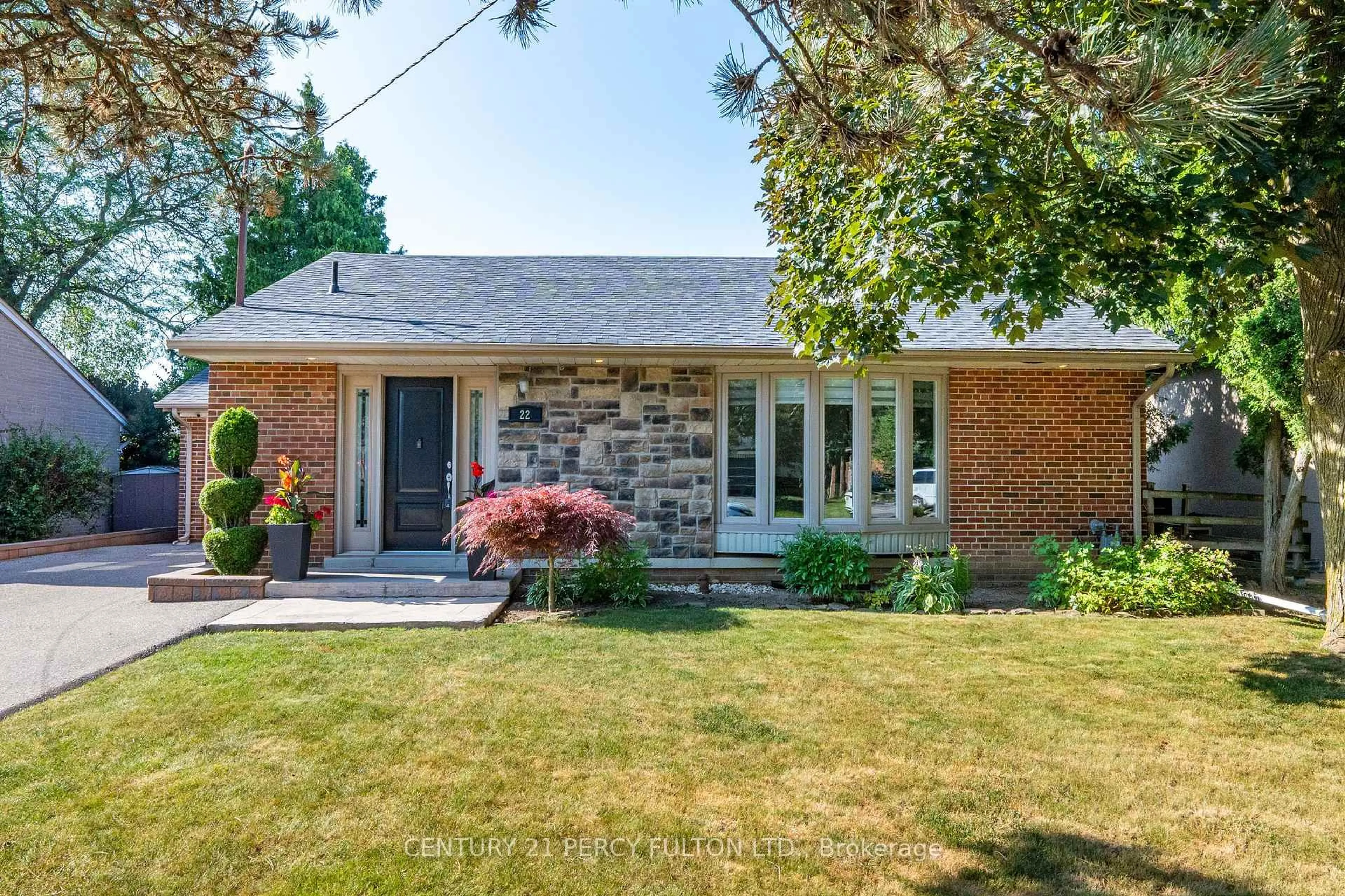 Home with brick exterior material, street for 22 Pitcairn Cres, Toronto Ontario M4A 1P4