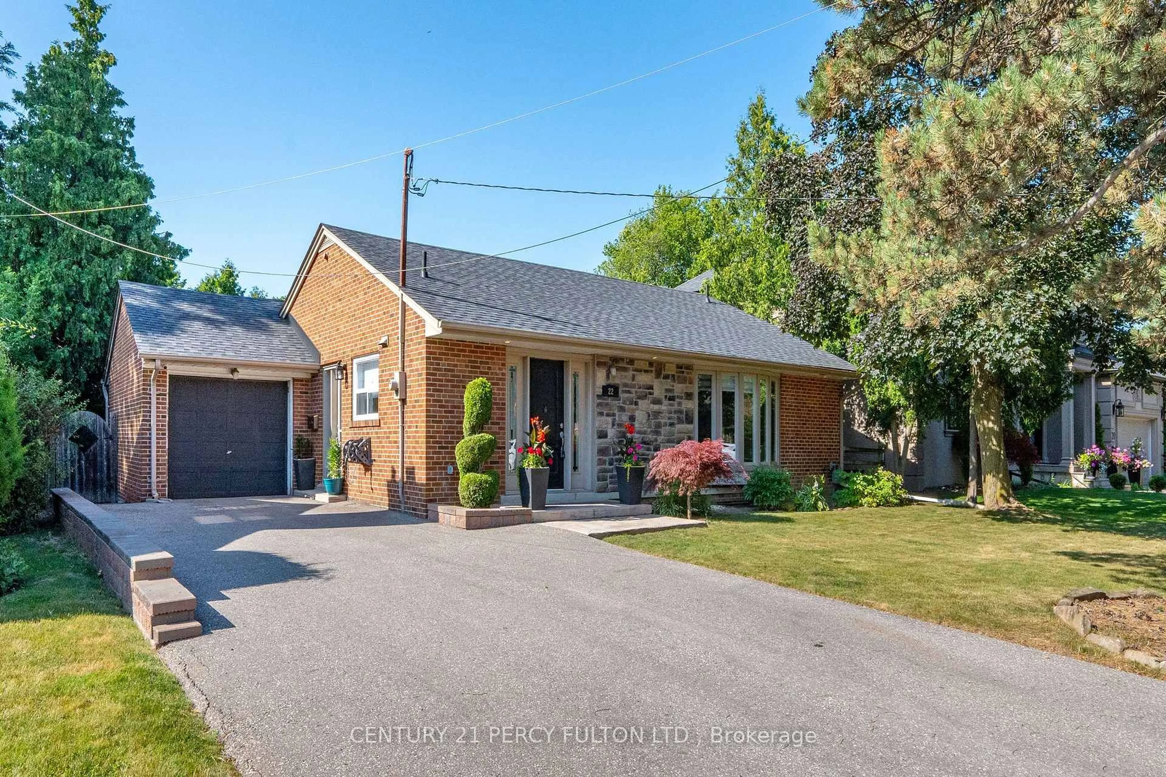Home with brick exterior material, street for 22 Pitcairn Cres, Toronto Ontario M4A 1P4