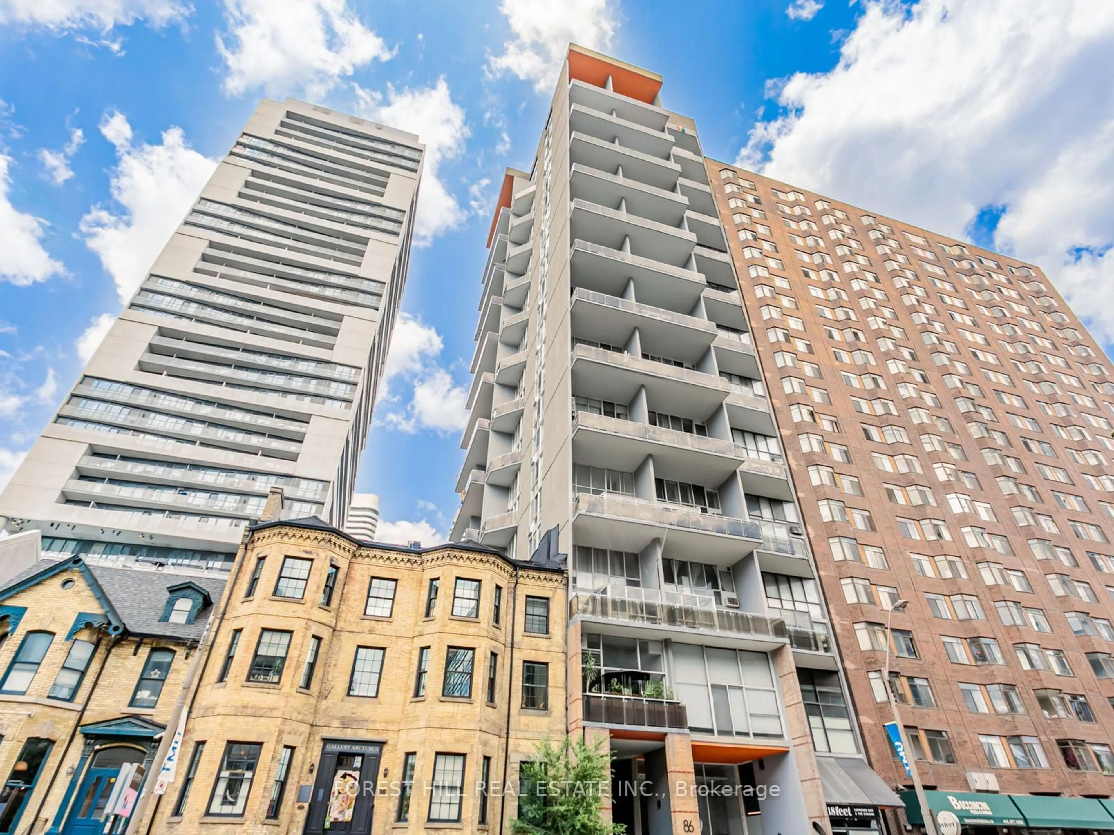 Patio, city buildings view from balcony for 86 Gerrard St #1E, Toronto Ontario M5B 2J1
