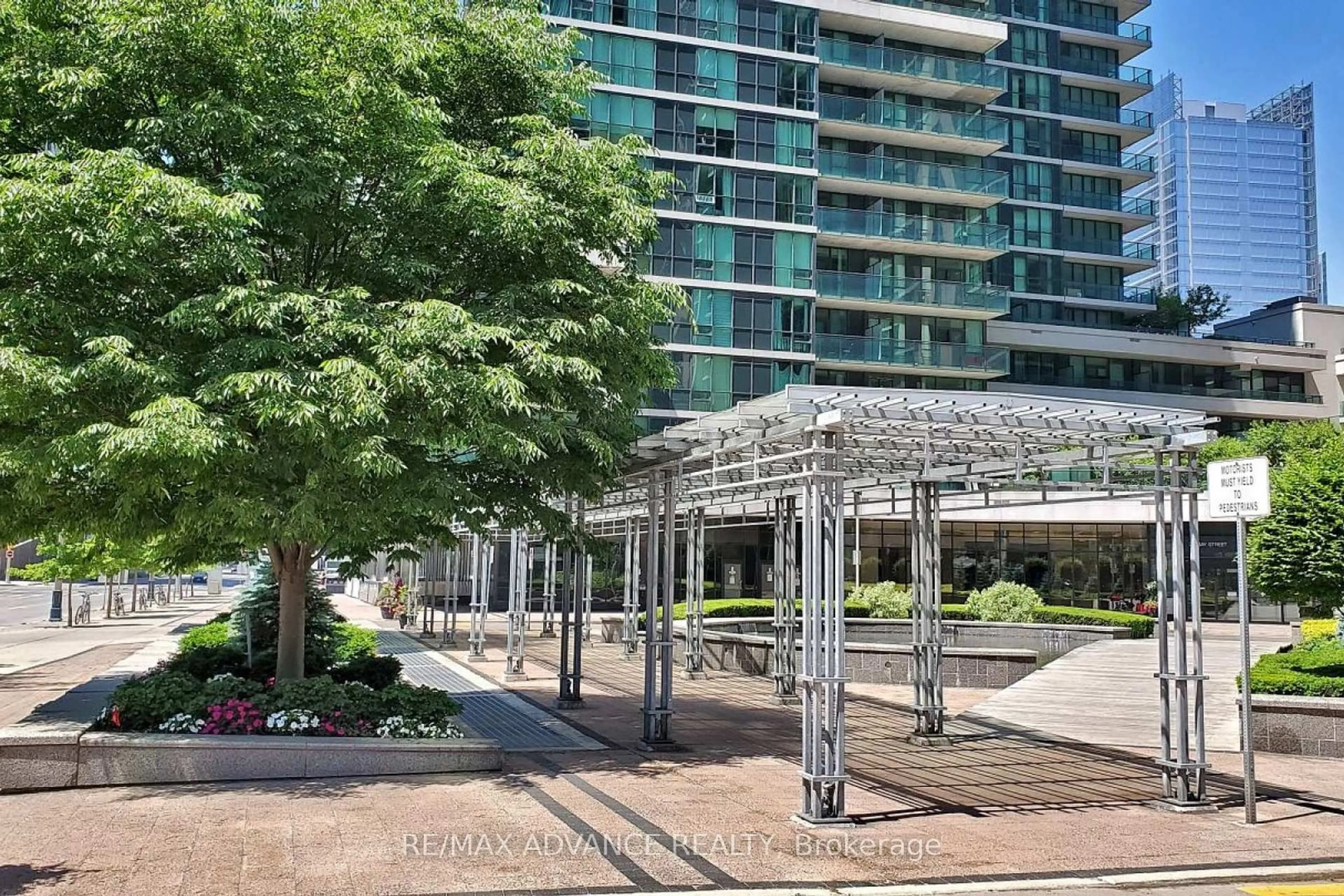 Patio, city buildings view from balcony for 33 Bay St #4713, Toronto Ontario M5J 2Z3