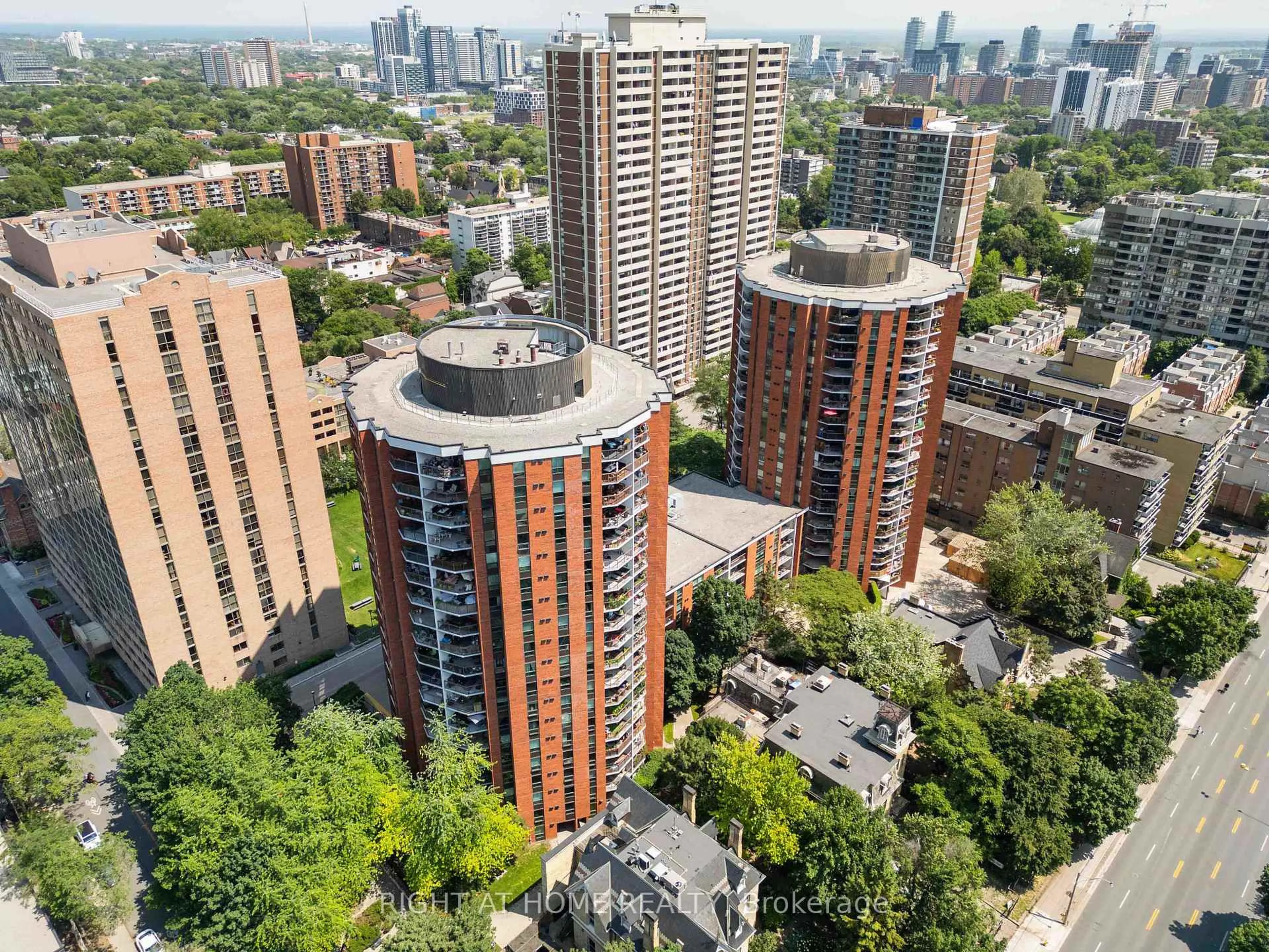 A pic from outside/outdoor area/front of a property/back of a property/a pic from drone, city buildings view from balcony for 77 Maitland Pl #1906, Toronto Ontario M4Y 2V6