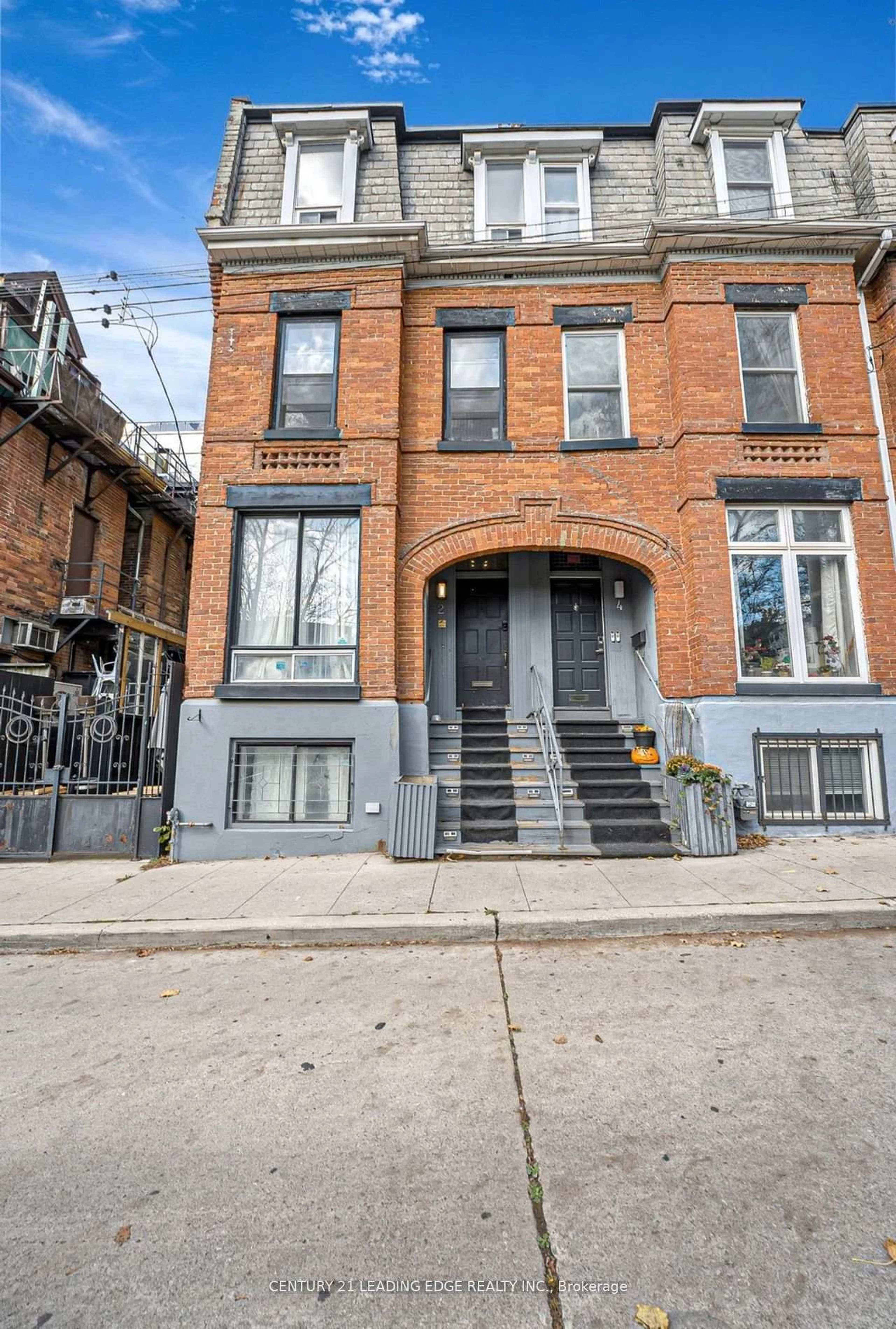 Home with brick exterior material, street for 2 Monteith St, Toronto Ontario M4Y 1K7