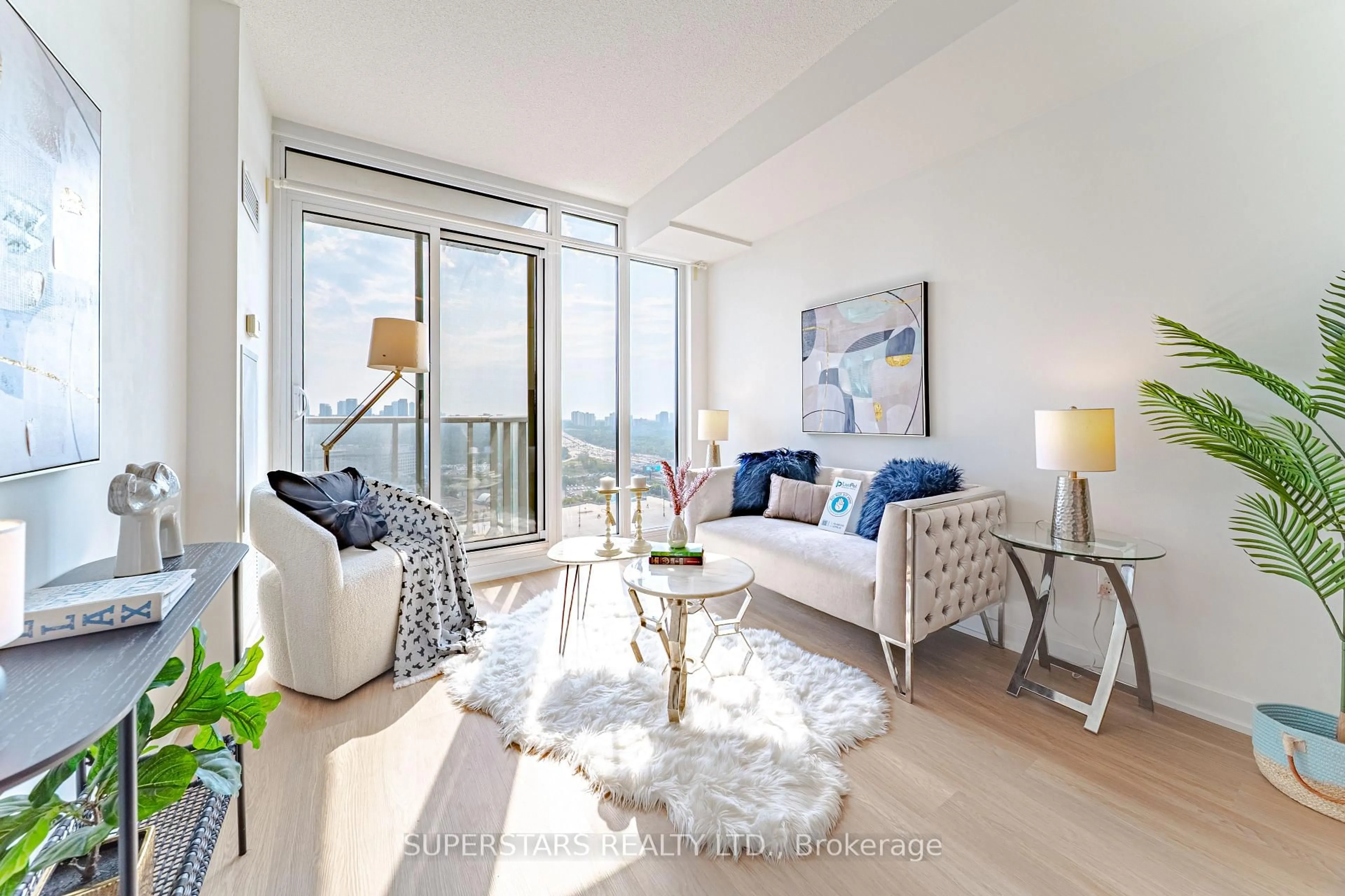 Living room with furniture, wood/laminate floor for 121 Mcmahon Dr #2306, Toronto Ontario M2K 0C2