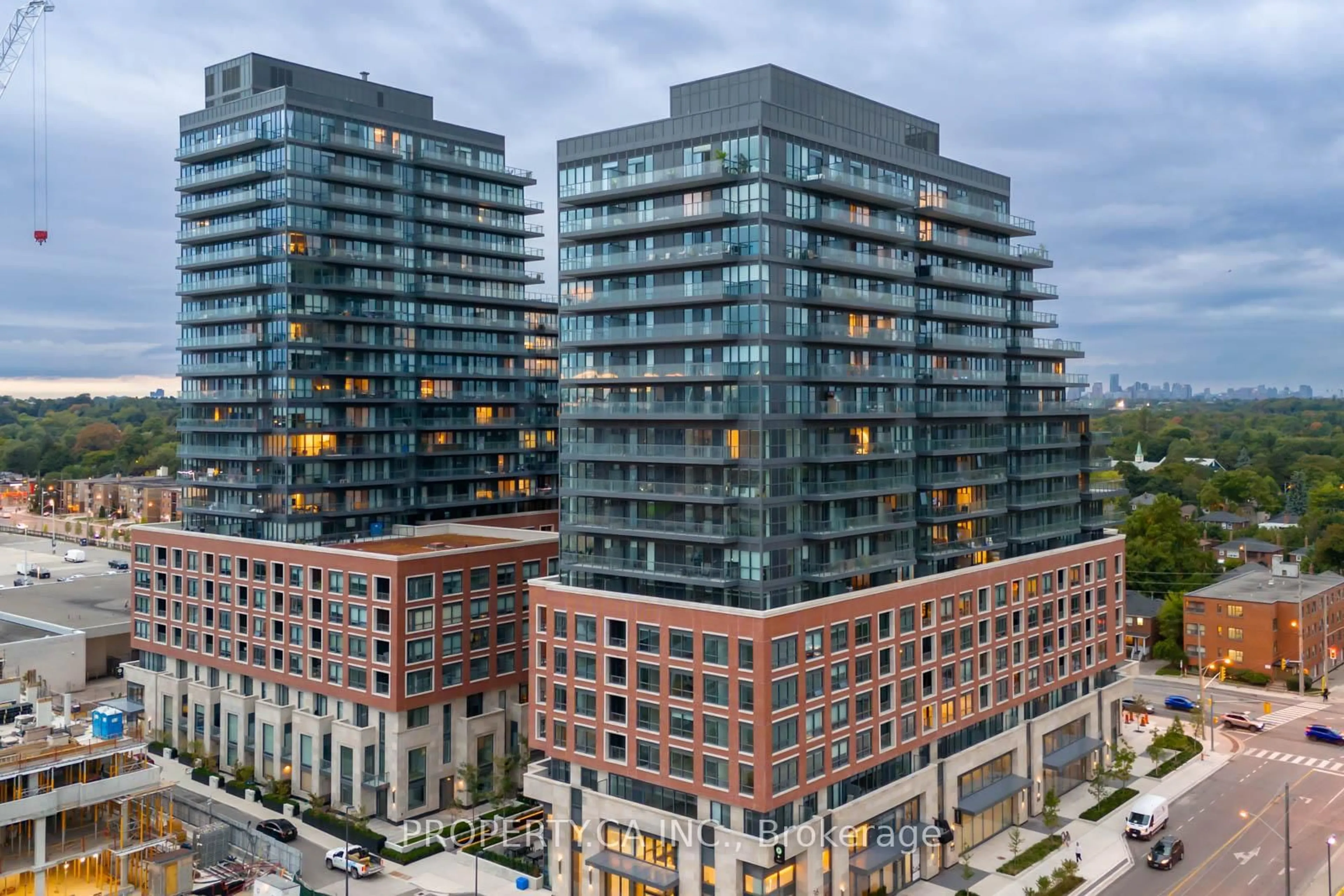 A pic from outside/outdoor area/front of a property/back of a property/a pic from drone, city buildings view from balcony for 33 Frederick Todd Way #303, Toronto Ontario M4G 0C9