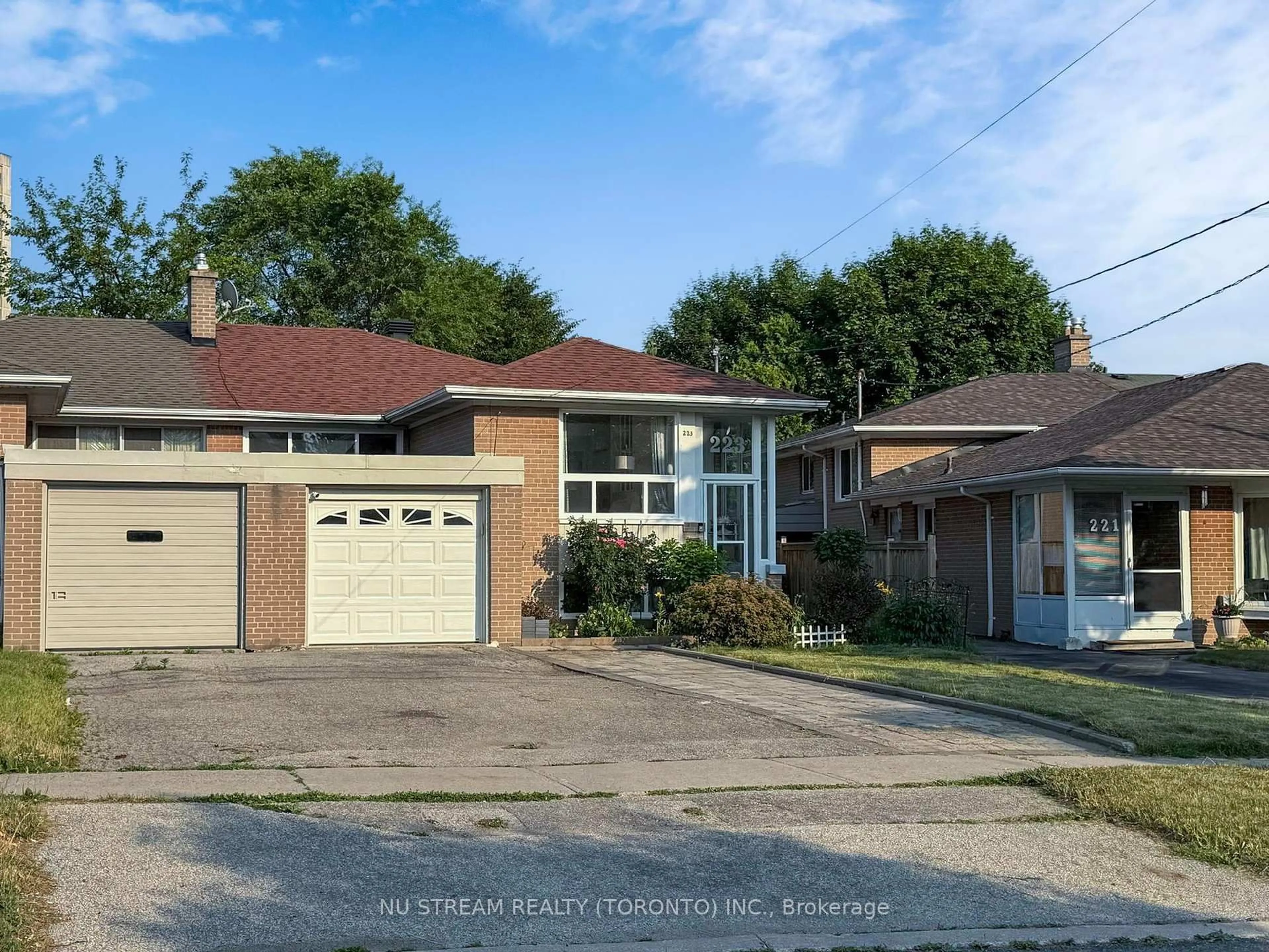 Home with brick exterior material, street for 223 Lynedock Cres, Toronto Ontario M3A 2B5