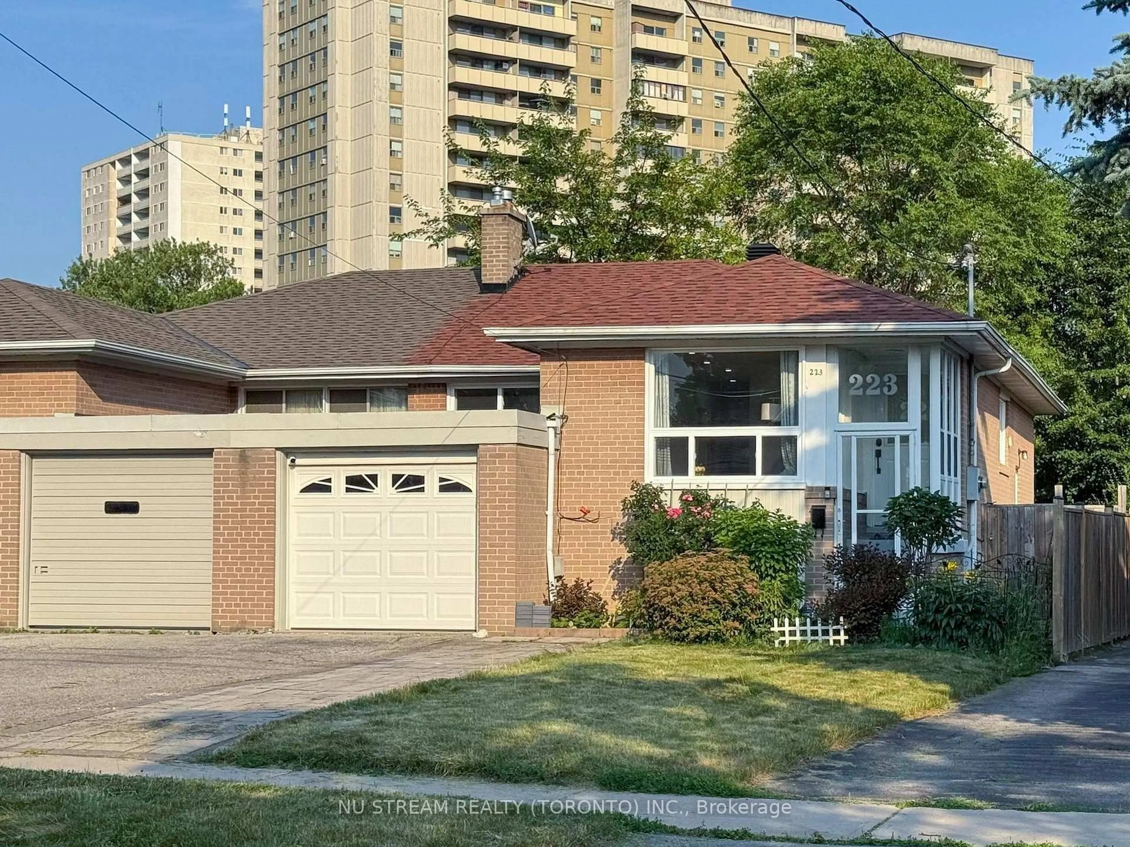 Home with brick exterior material, street for 223 Lynedock Cres, Toronto Ontario M3A 2B5