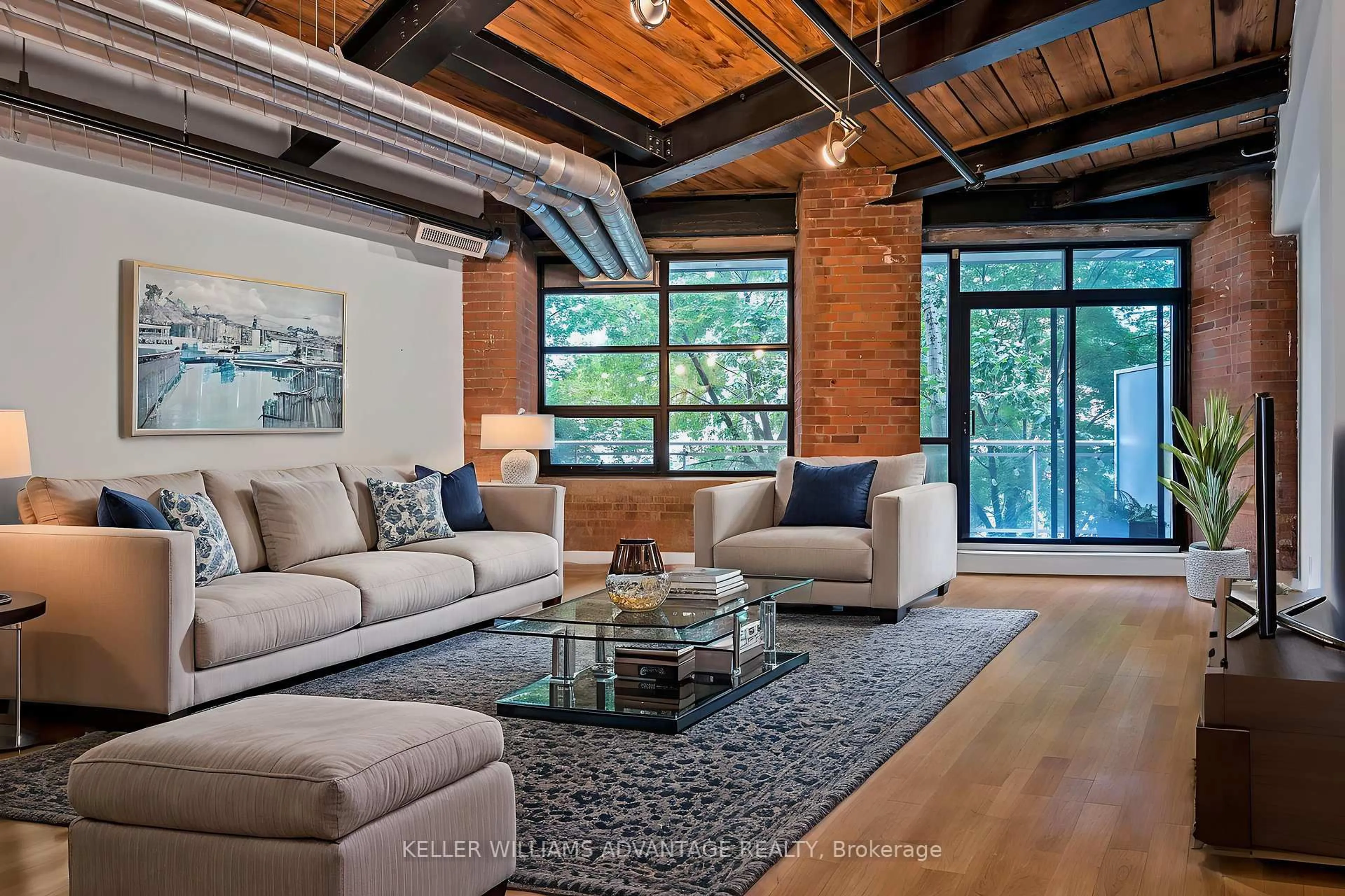 Living room with furniture, unknown for 43 Hanna Ave #207, Toronto Ontario M6K 1X6